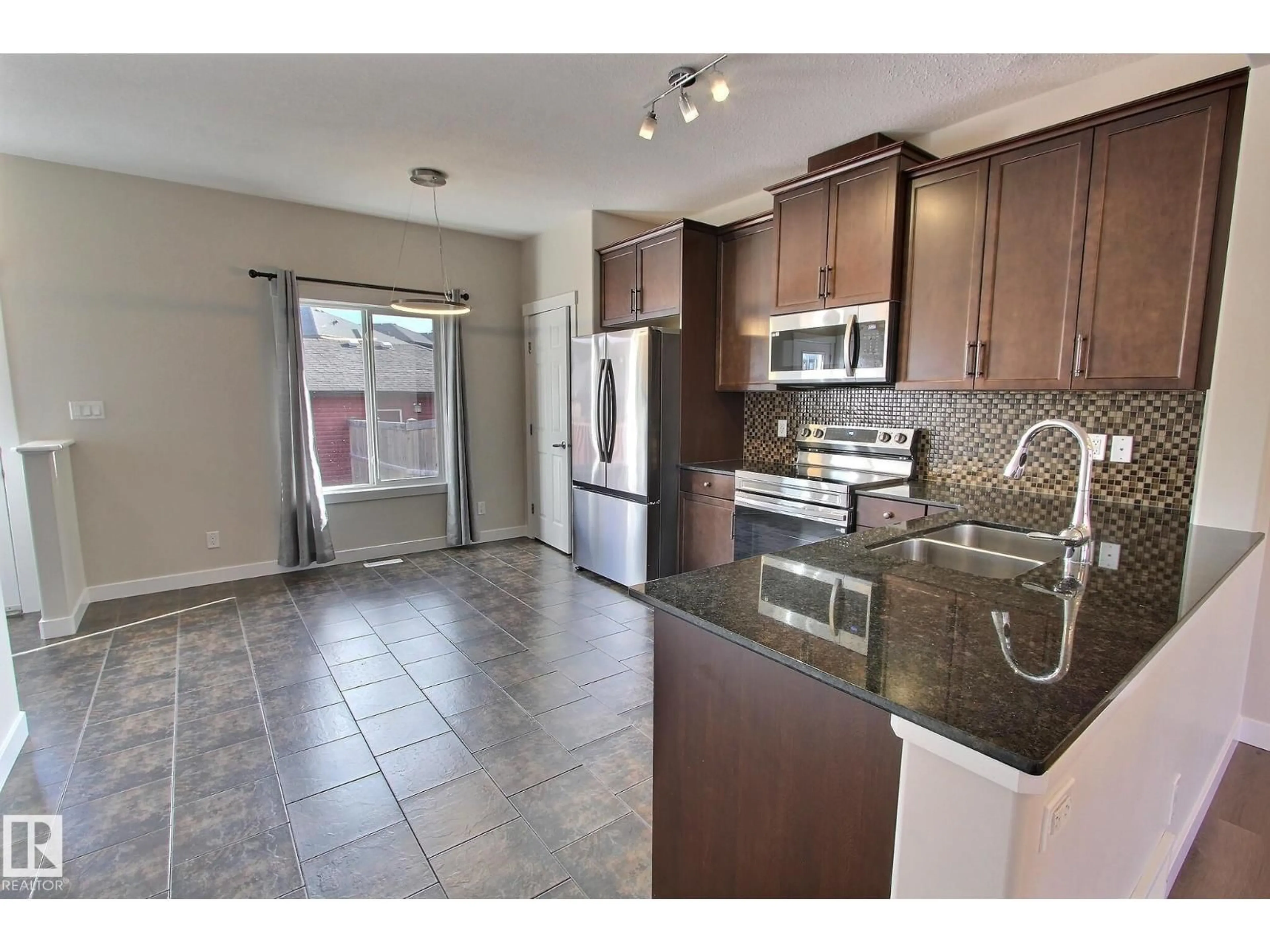 Open concept kitchen, ceramic/tile floor for 356 PIONEER RD, Spruce Grove Alberta T7X0T1