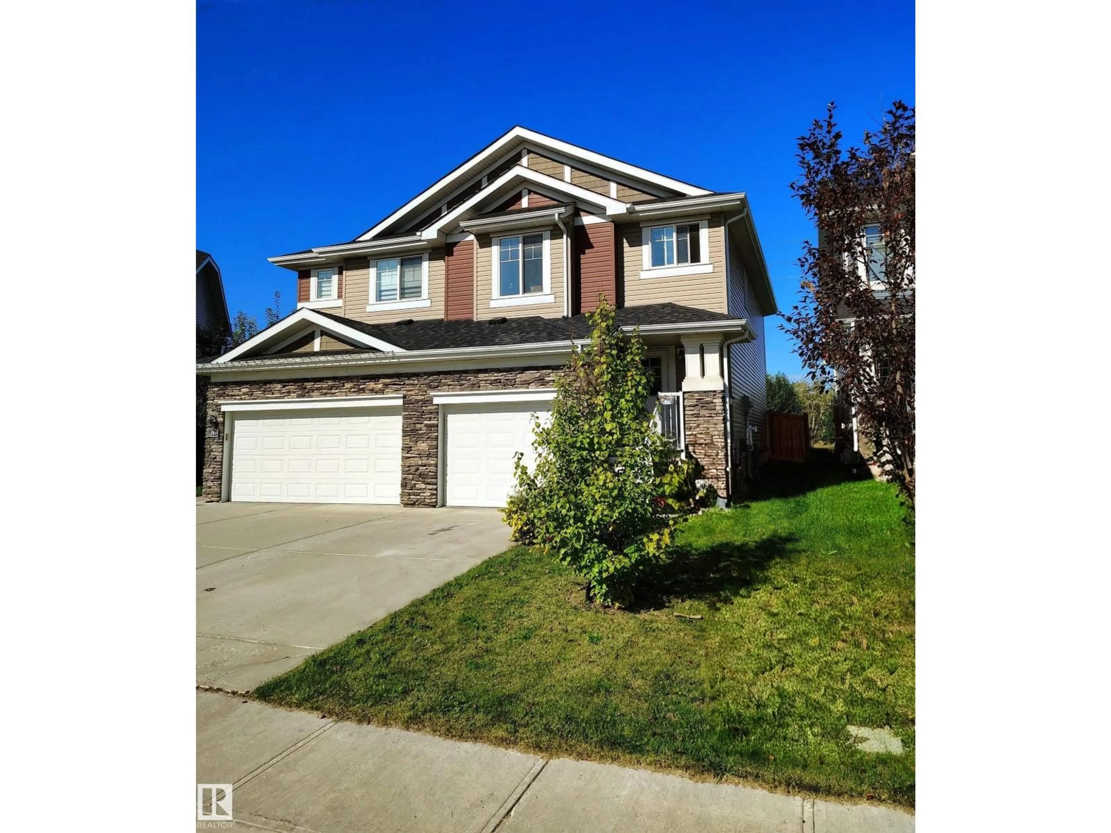 Home with vinyl exterior material, street for 3833 ROBINS CR, Edmonton Alberta T5S0M7