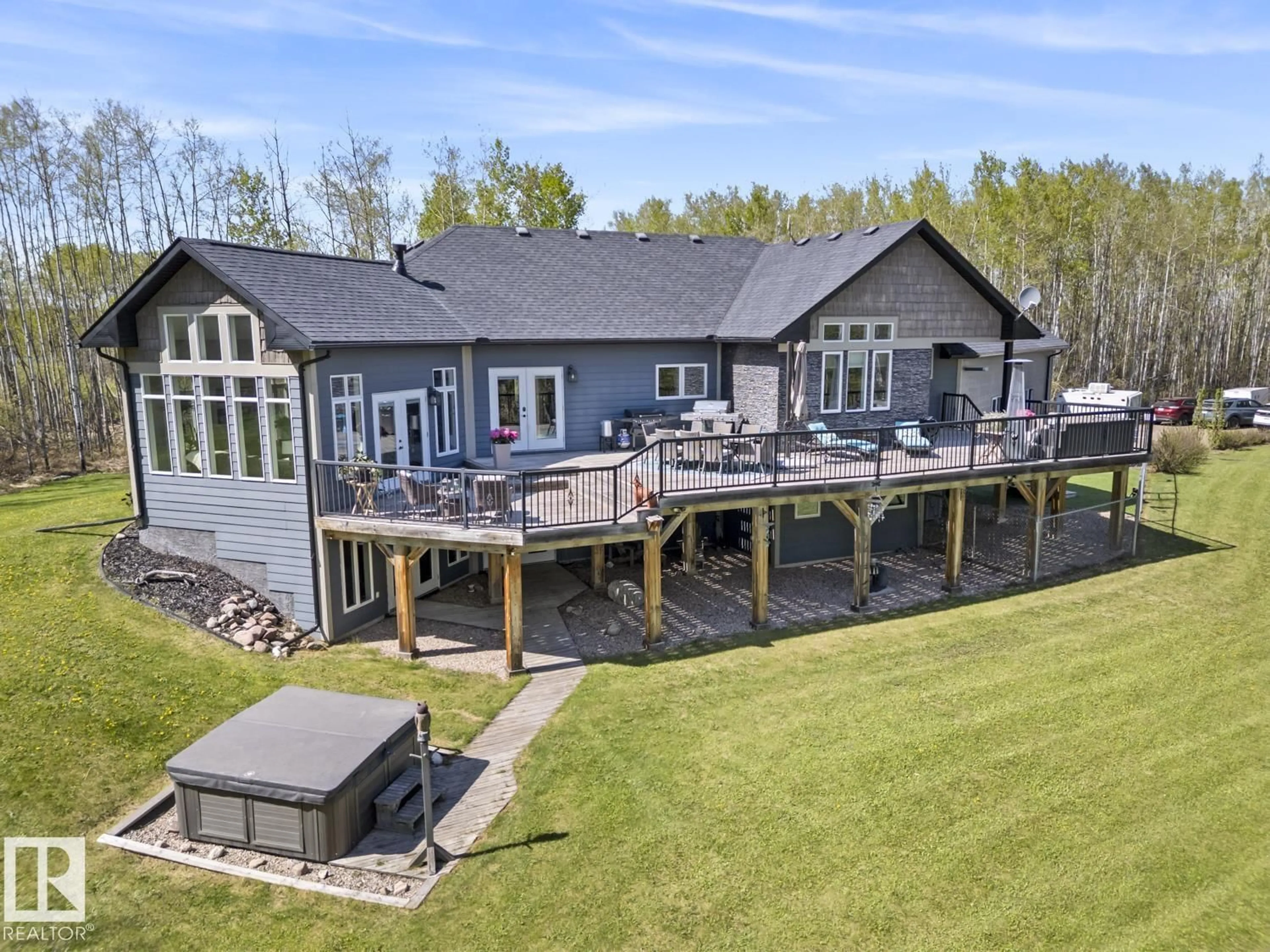 A pic from outside/outdoor area/front of a property/back of a property/a pic from drone, water/lake/river/ocean view for 62519 RR 412 A, Rural Bonnyville M.D. Alberta T9M1P4