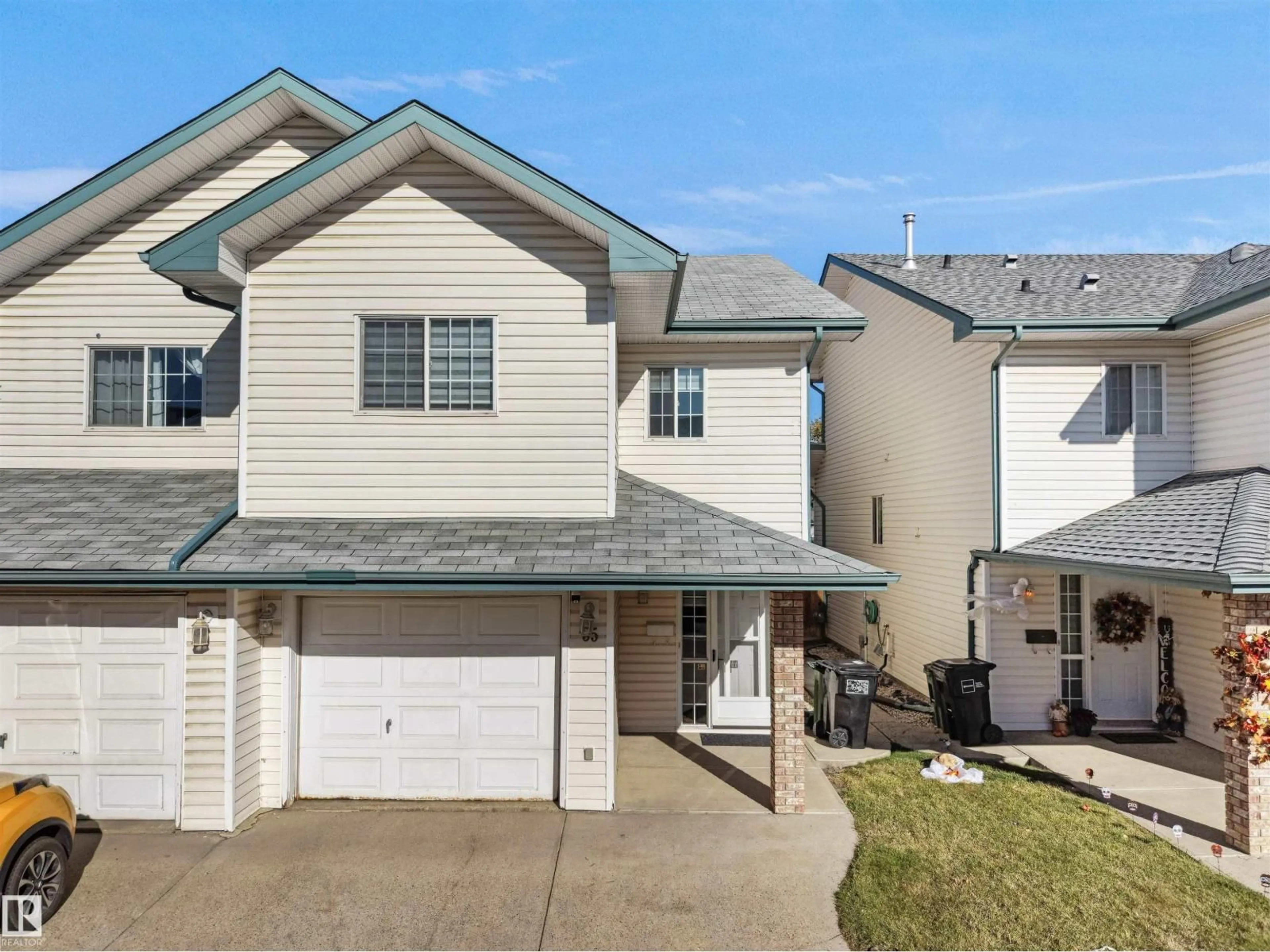 Home with vinyl exterior material, street for 843 - 35 YOUVILLE DR, Edmonton Alberta T6L6X8