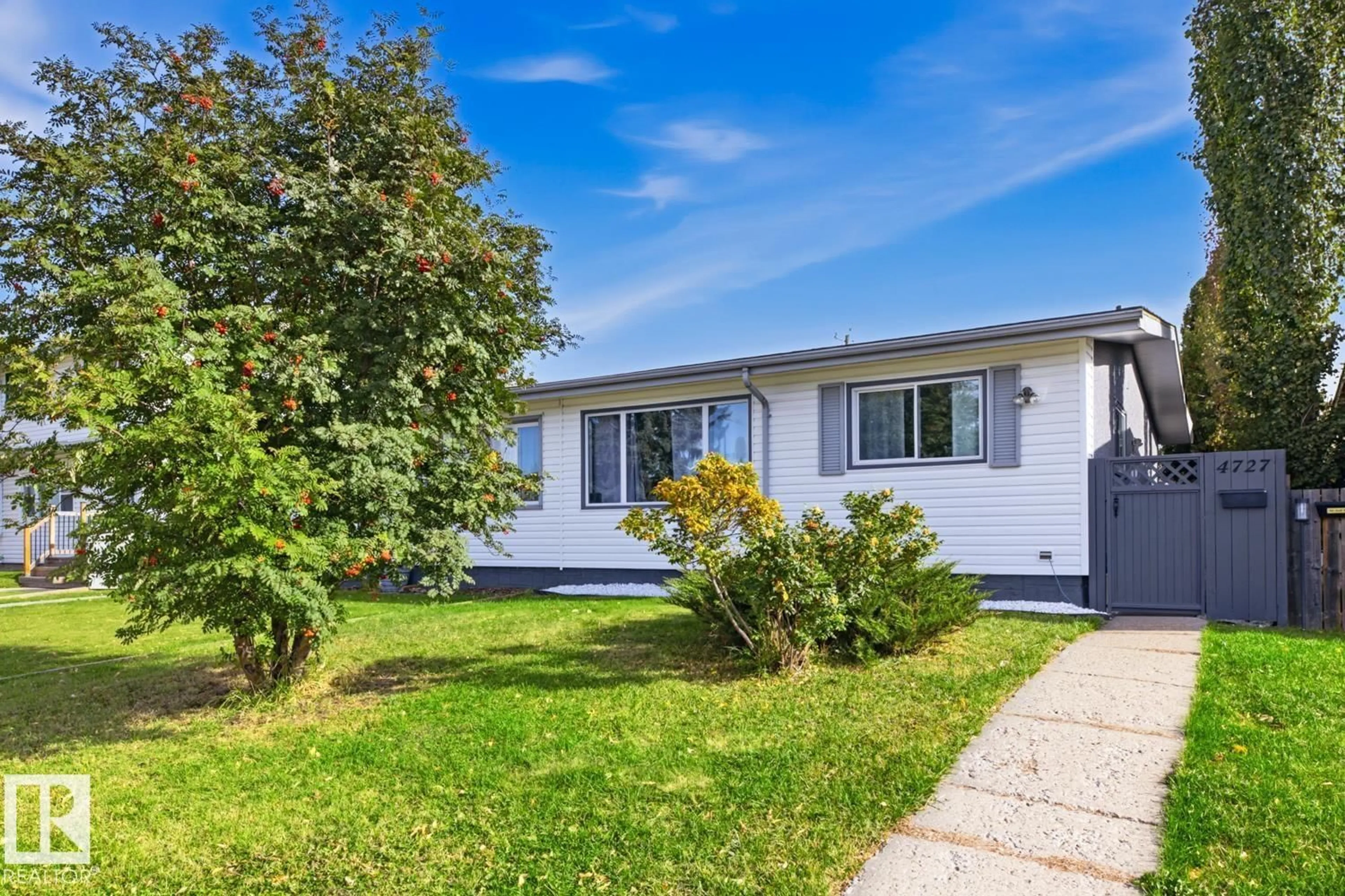Home with vinyl exterior material, street for 4727 105 ST, Edmonton Alberta T6H2M3