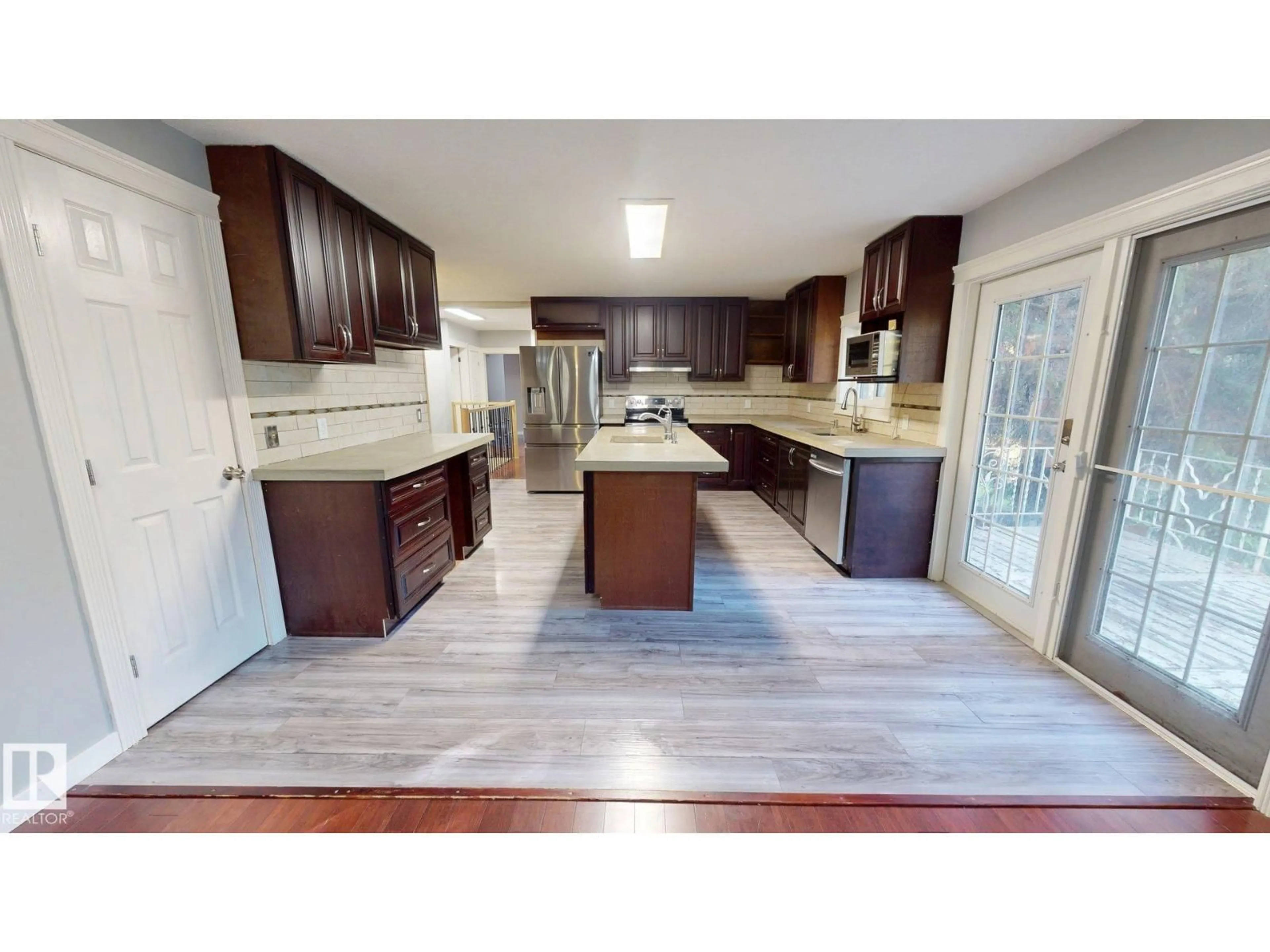 Open concept kitchen, unknown for NW - 9712 209 ST, Edmonton Alberta T5T5X9