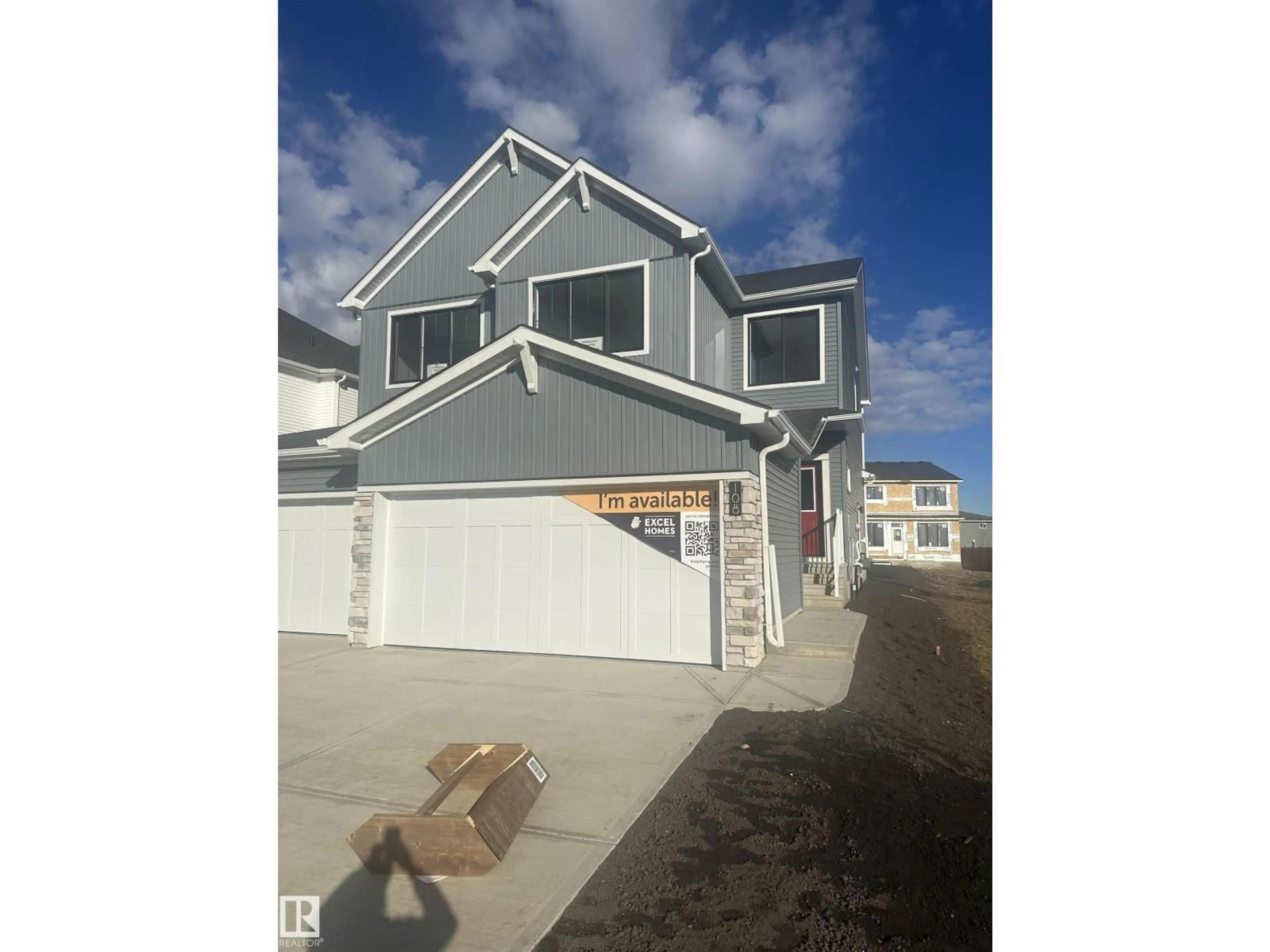 Home with vinyl exterior material, street for 108 EDGEMONT WD, Edmonton Alberta T6M3K5