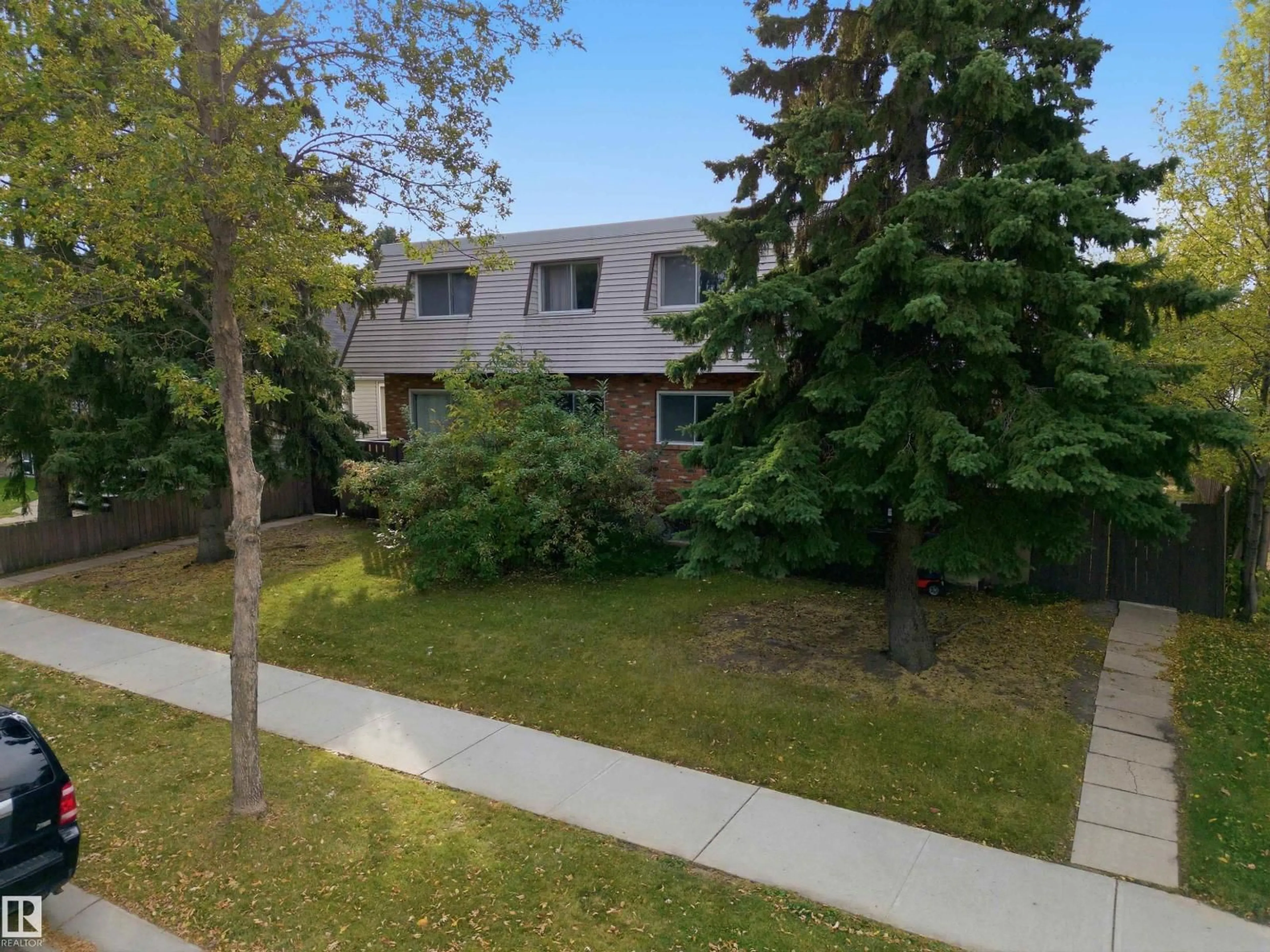 A pic from outside/outdoor area/front of a property/back of a property/a pic from drone, street for NW - 8945 78 AV, Edmonton Alberta T6C0N7