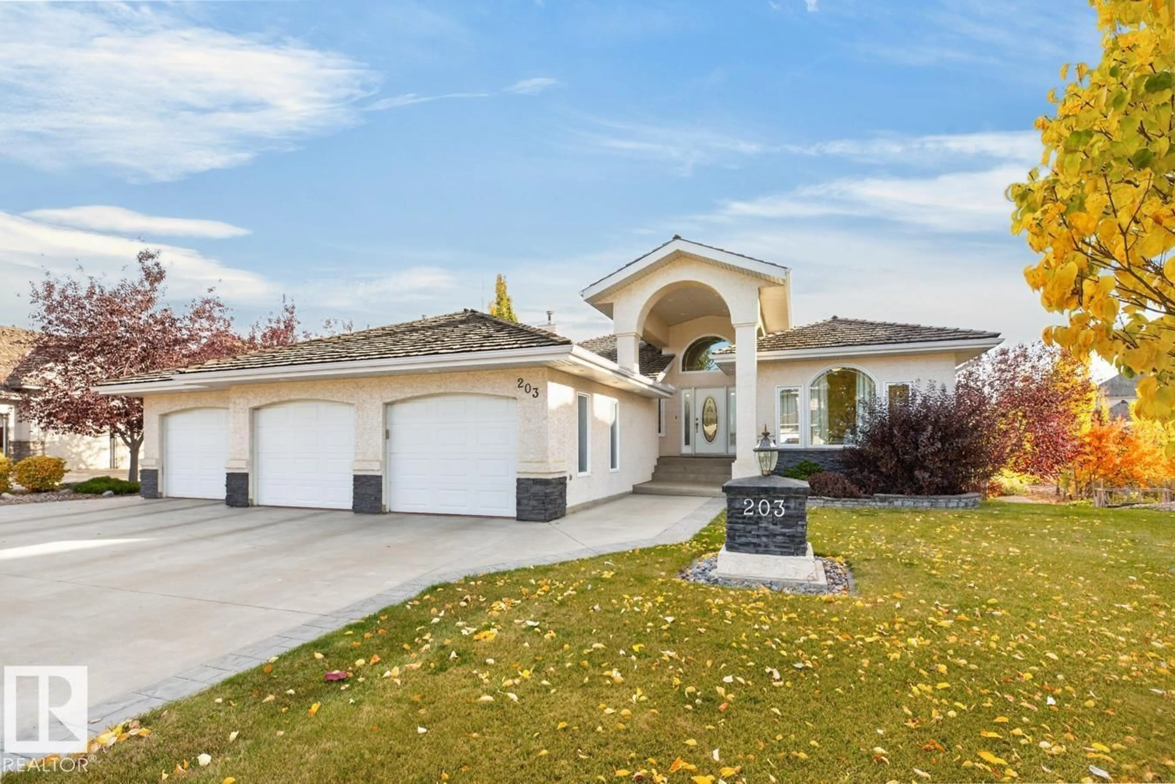 Home with vinyl exterior material, street for #203 - 52304 RGE ROAD 233, Rural Strathcona County Alberta T8B1C9