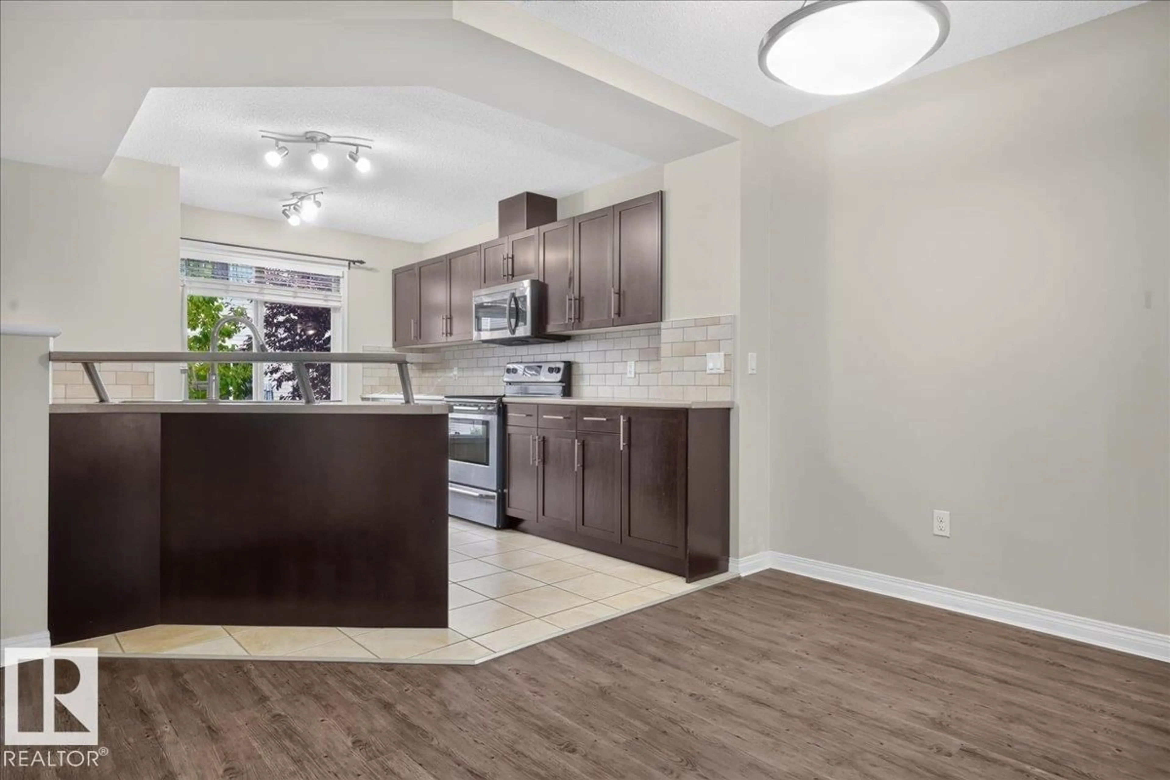 Open concept kitchen, unknown for SW - 61 1804 70 ST, Edmonton Alberta T6X0H4