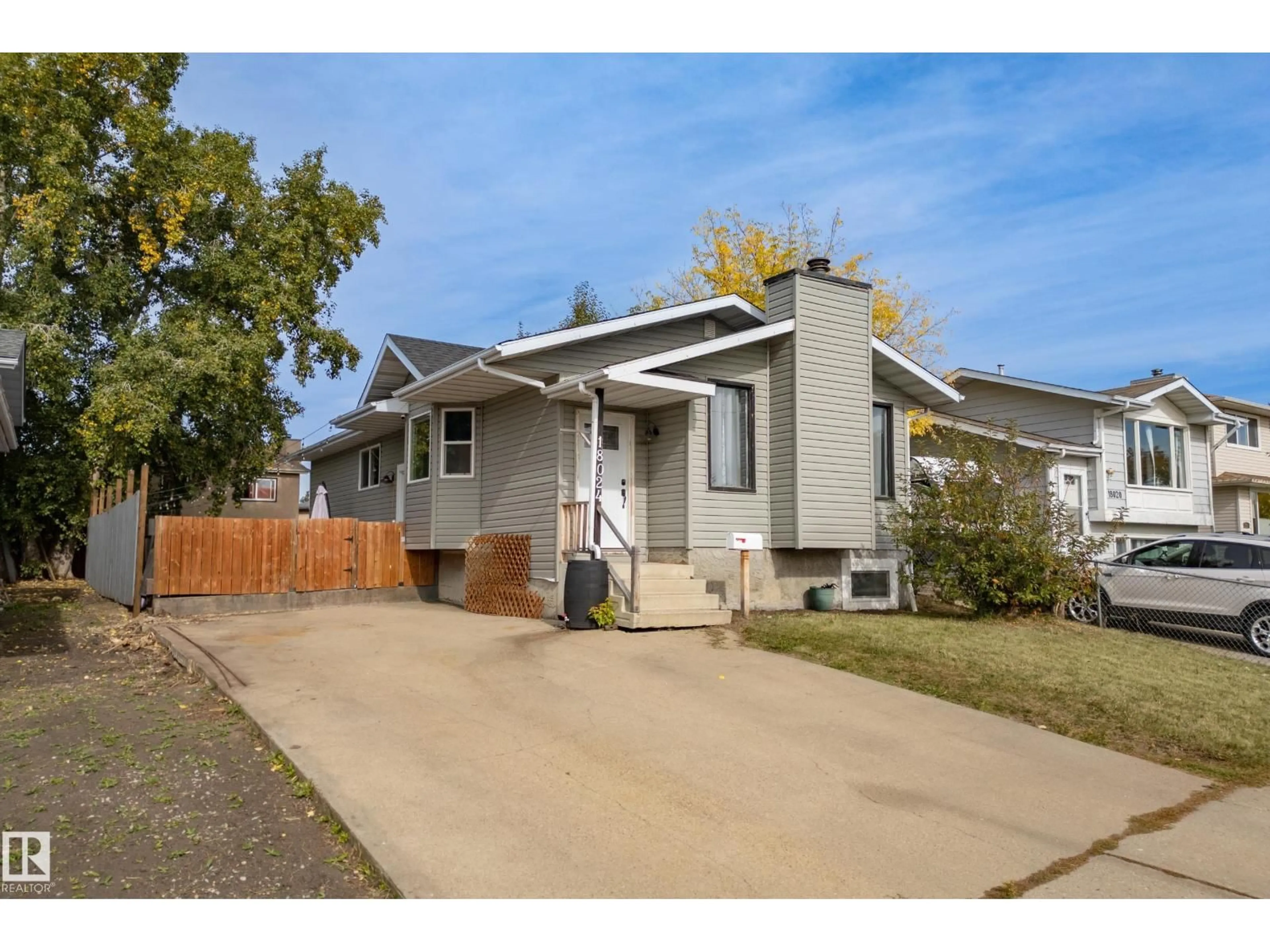 Home with vinyl exterior material, street for 18024 73 AV, Edmonton Alberta T5T3K3