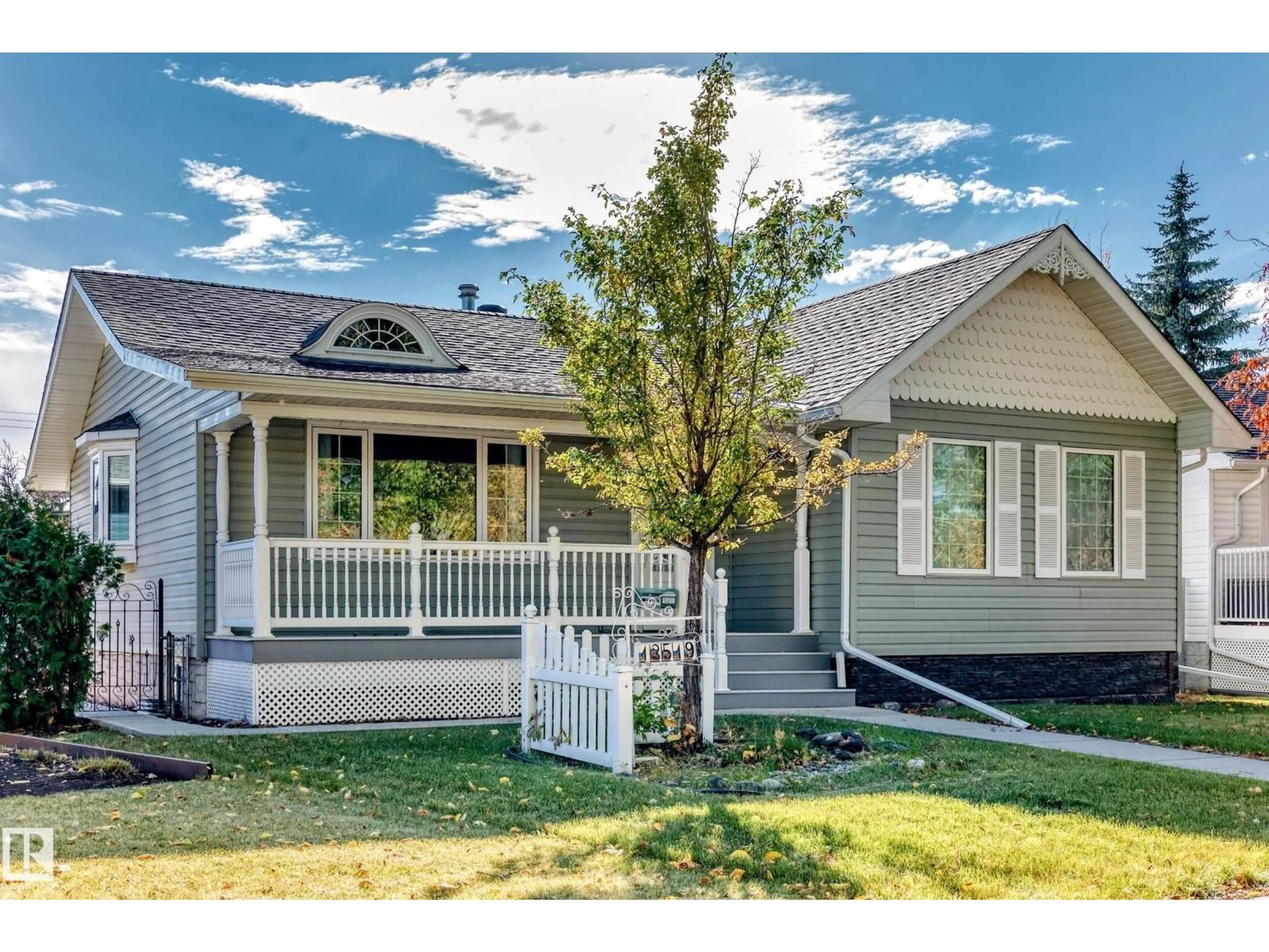 Home with vinyl exterior material, street for NW - 13519 123A AV, Edmonton Alberta T5L2Z1