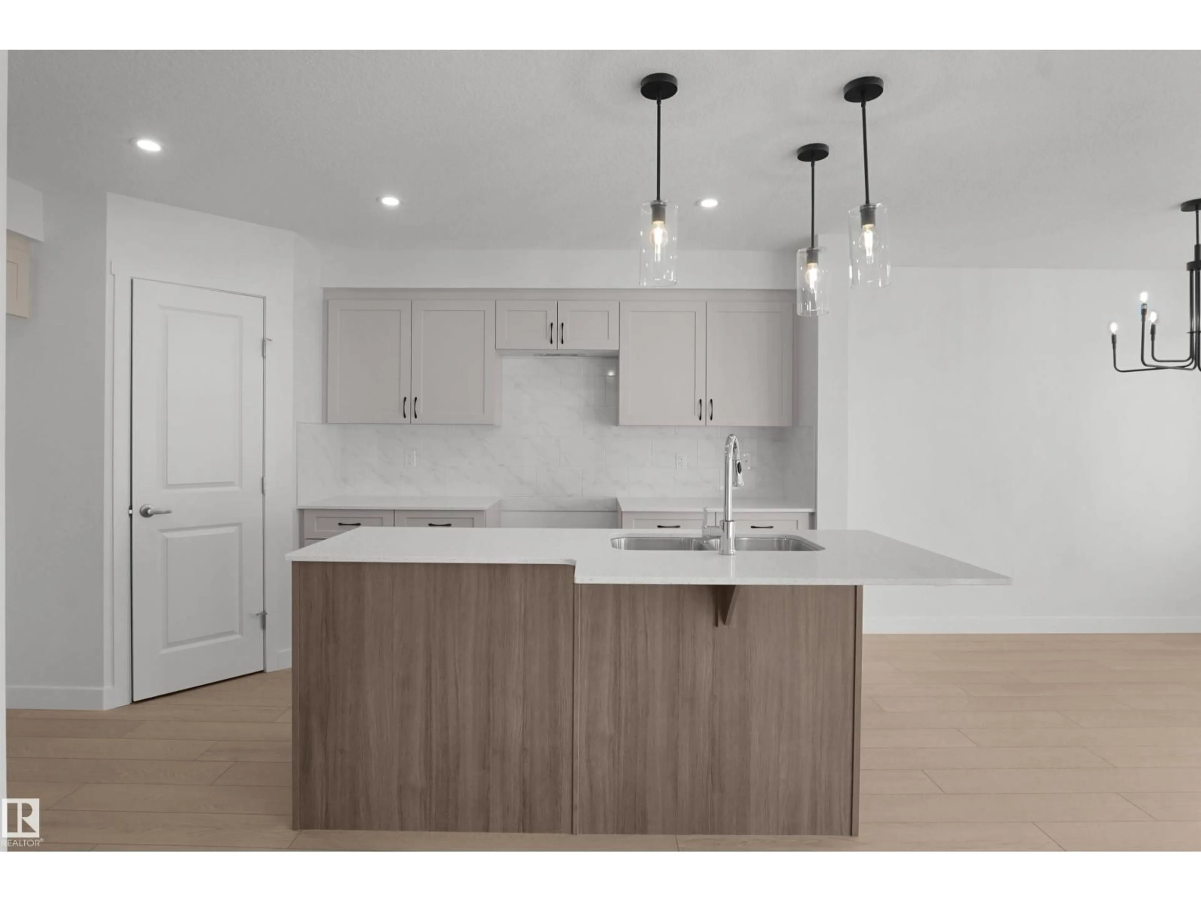 Open concept kitchen, wood/laminate floor for NW - 1862 187 ST, Edmonton Alberta T6M3N7