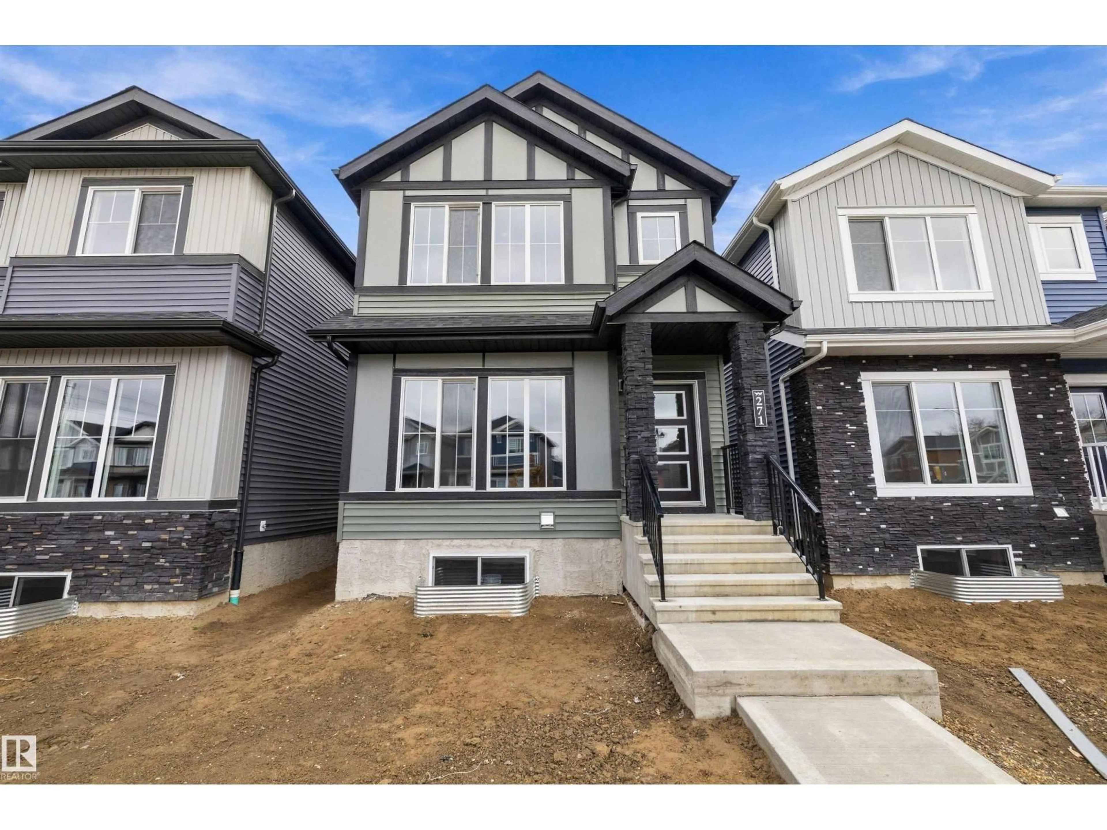 Home with vinyl exterior material, street for 271 EDGEMONT GR, Edmonton Alberta T6M3J7