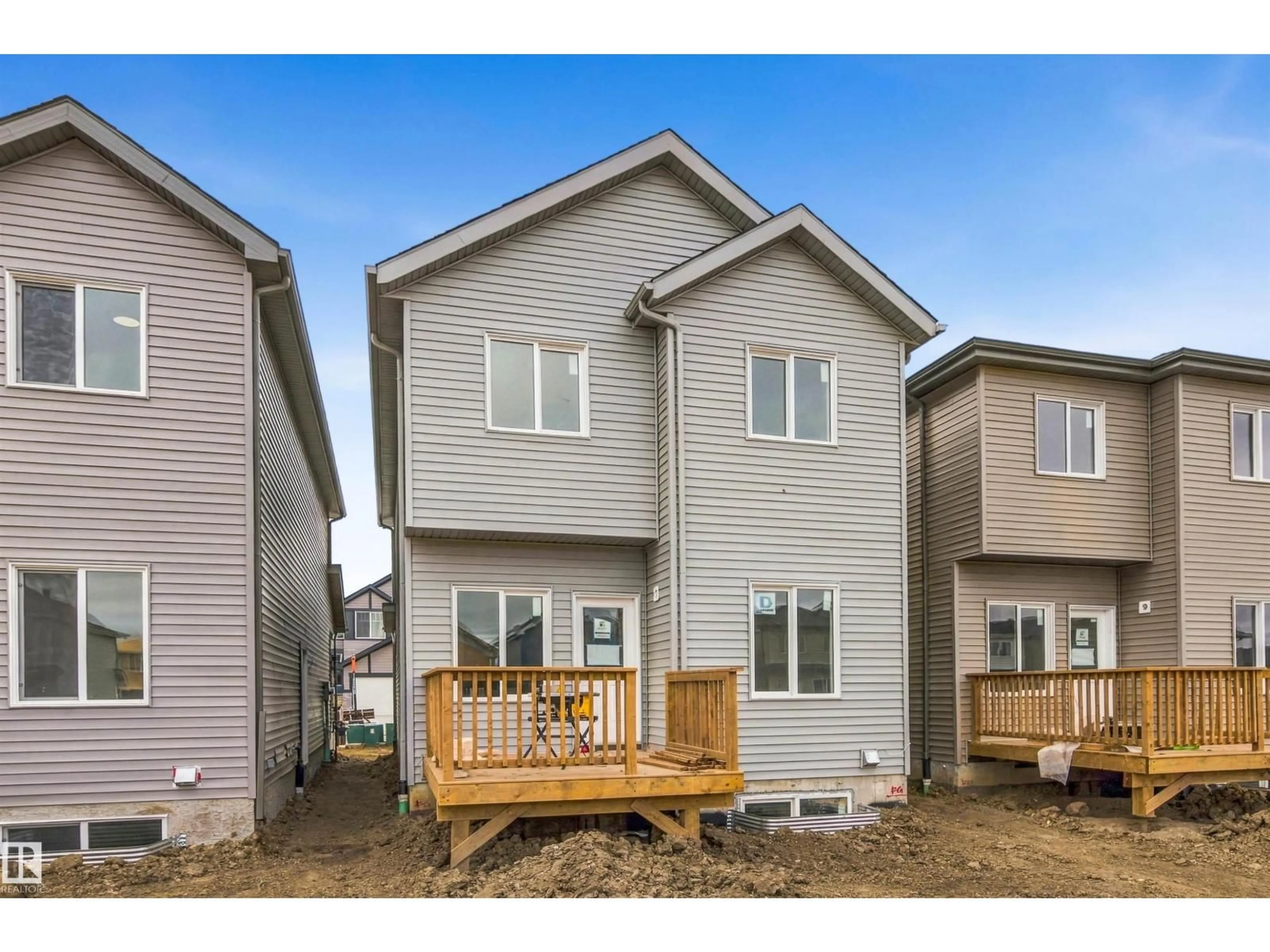 Home with vinyl exterior material, street for 612 ASHGROVE CI, Leduc Alberta T9E1X4