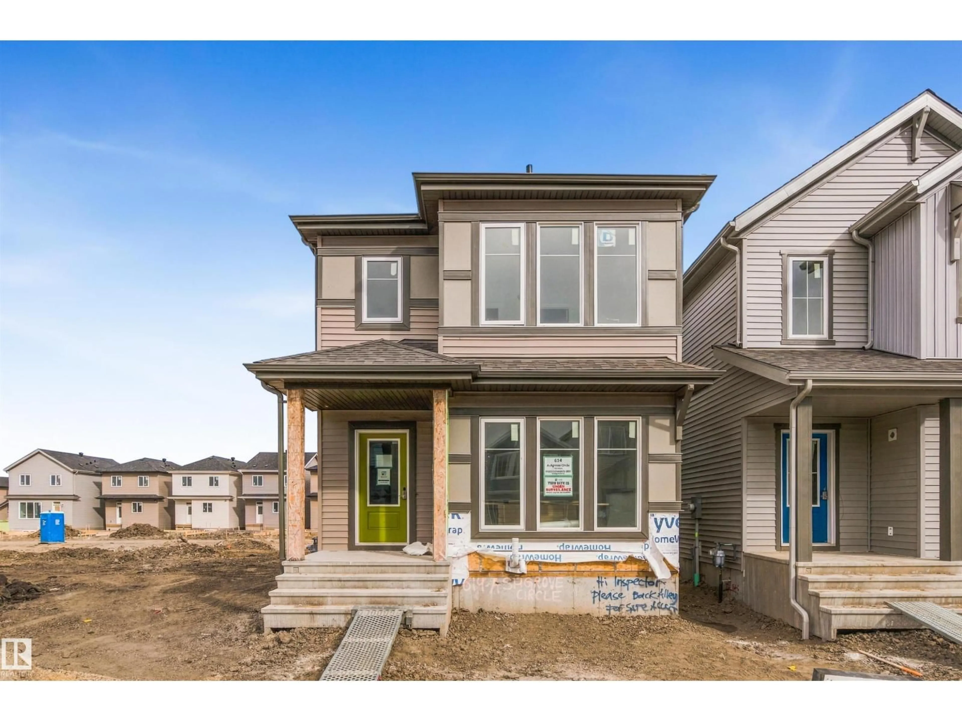 Home with vinyl exterior material, street for 614 ASHGROVE CI, Leduc Alberta T9E1X4