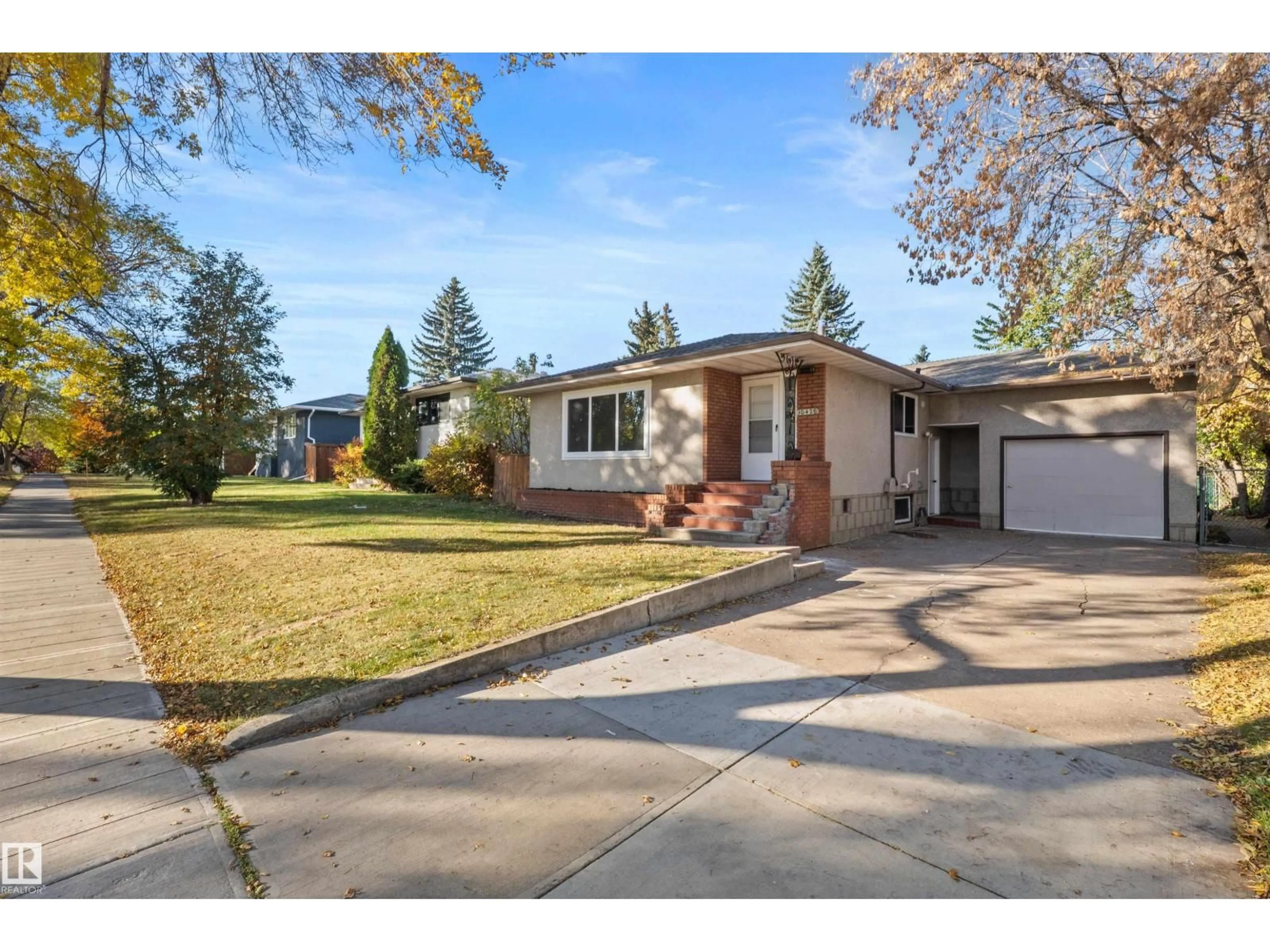 Home with brick exterior material, street for 10428 64 AV NW, Edmonton Alberta T6H1S7