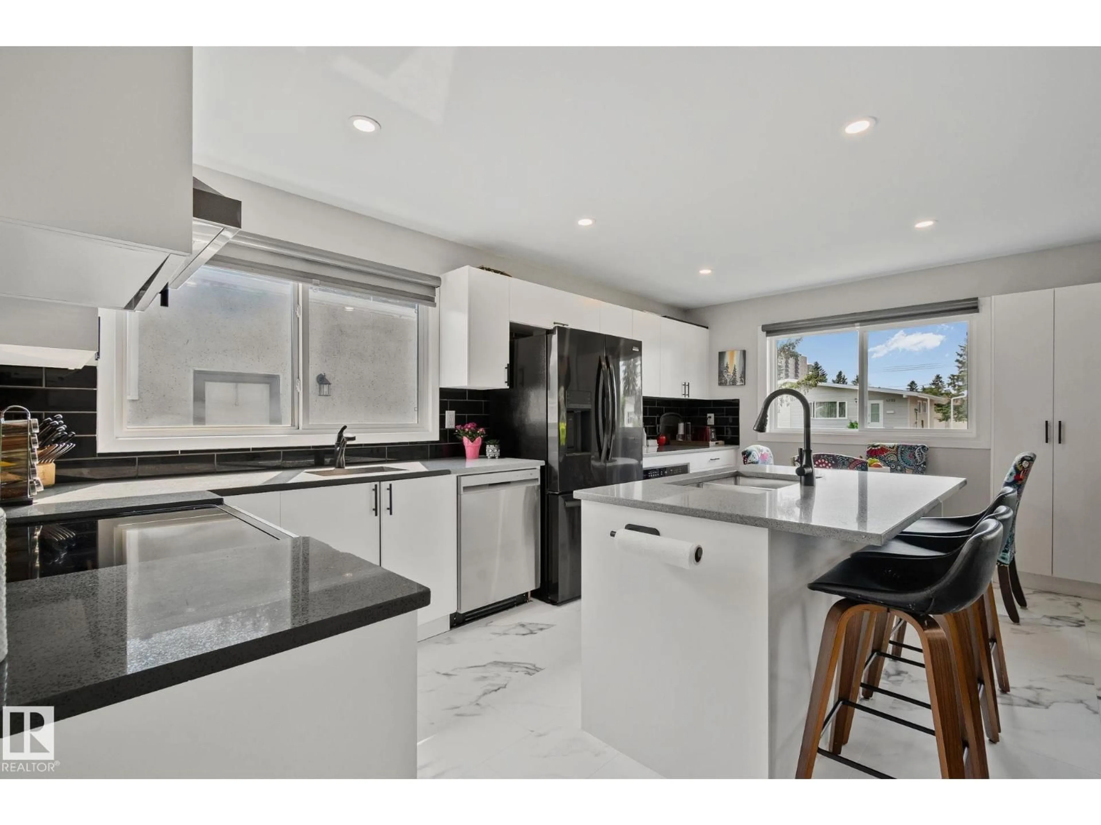 Open concept kitchen, ceramic/tile floor for 4723 105 ST, Edmonton Alberta T6H2M3