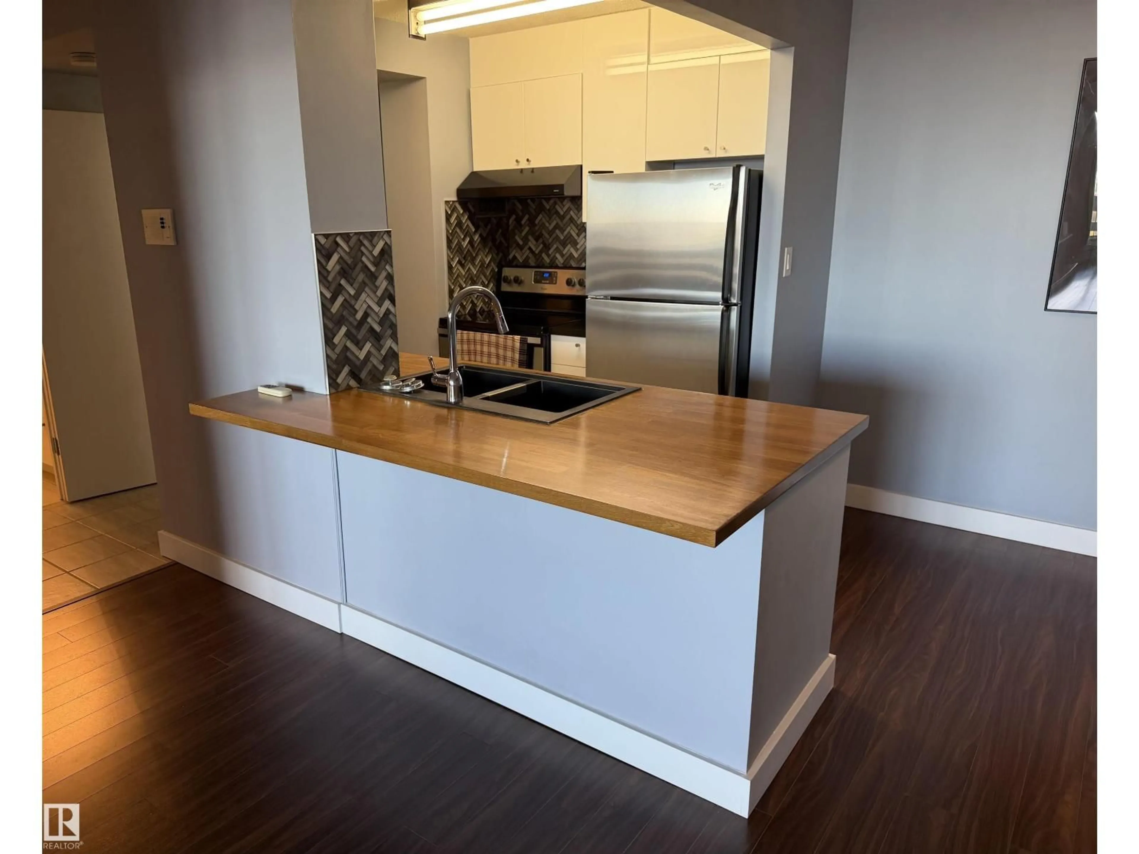 Open concept kitchen, wood/laminate floor for 1304 - 10160 116 ST, Edmonton Alberta T5K1V9
