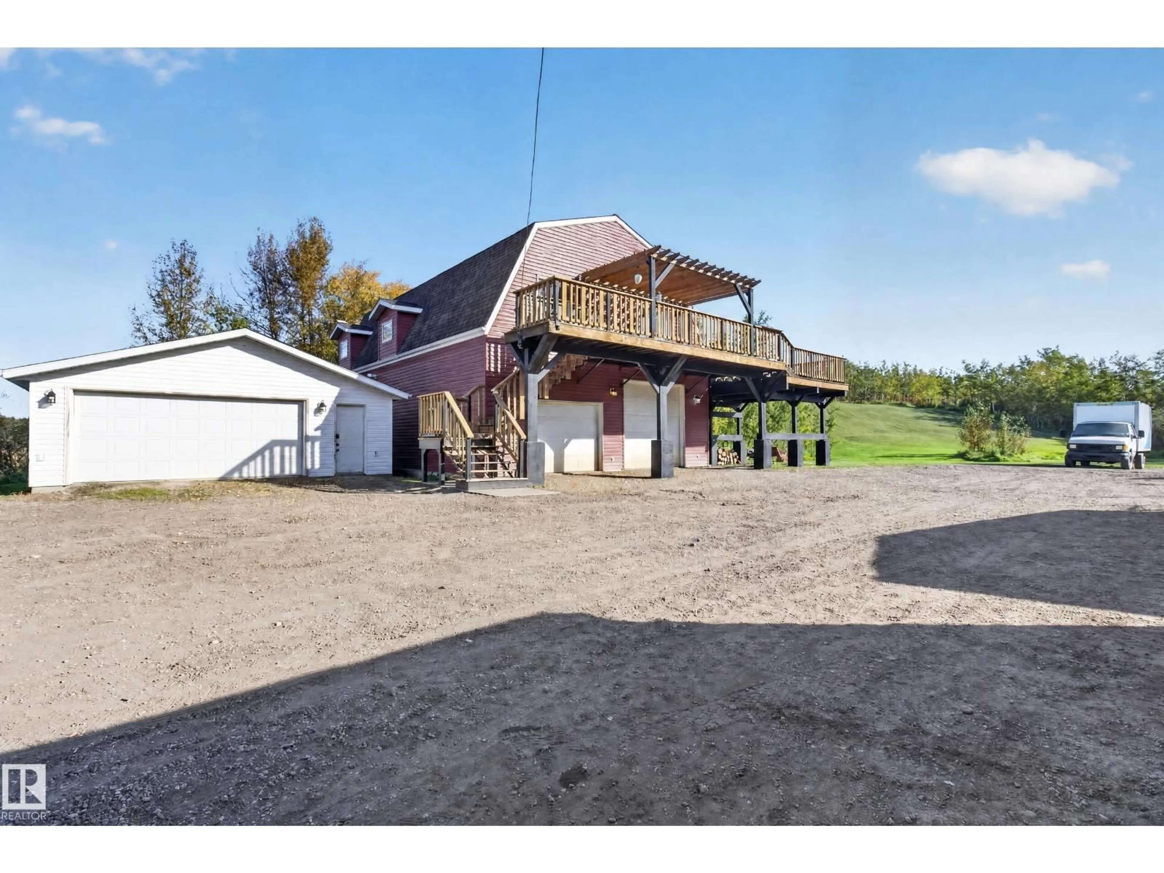 A pic from outside/outdoor area/front of a property/back of a property/a pic from drone, unknown for 48137 RGE RD 232, Rural Leduc County Alberta T0C1Z0