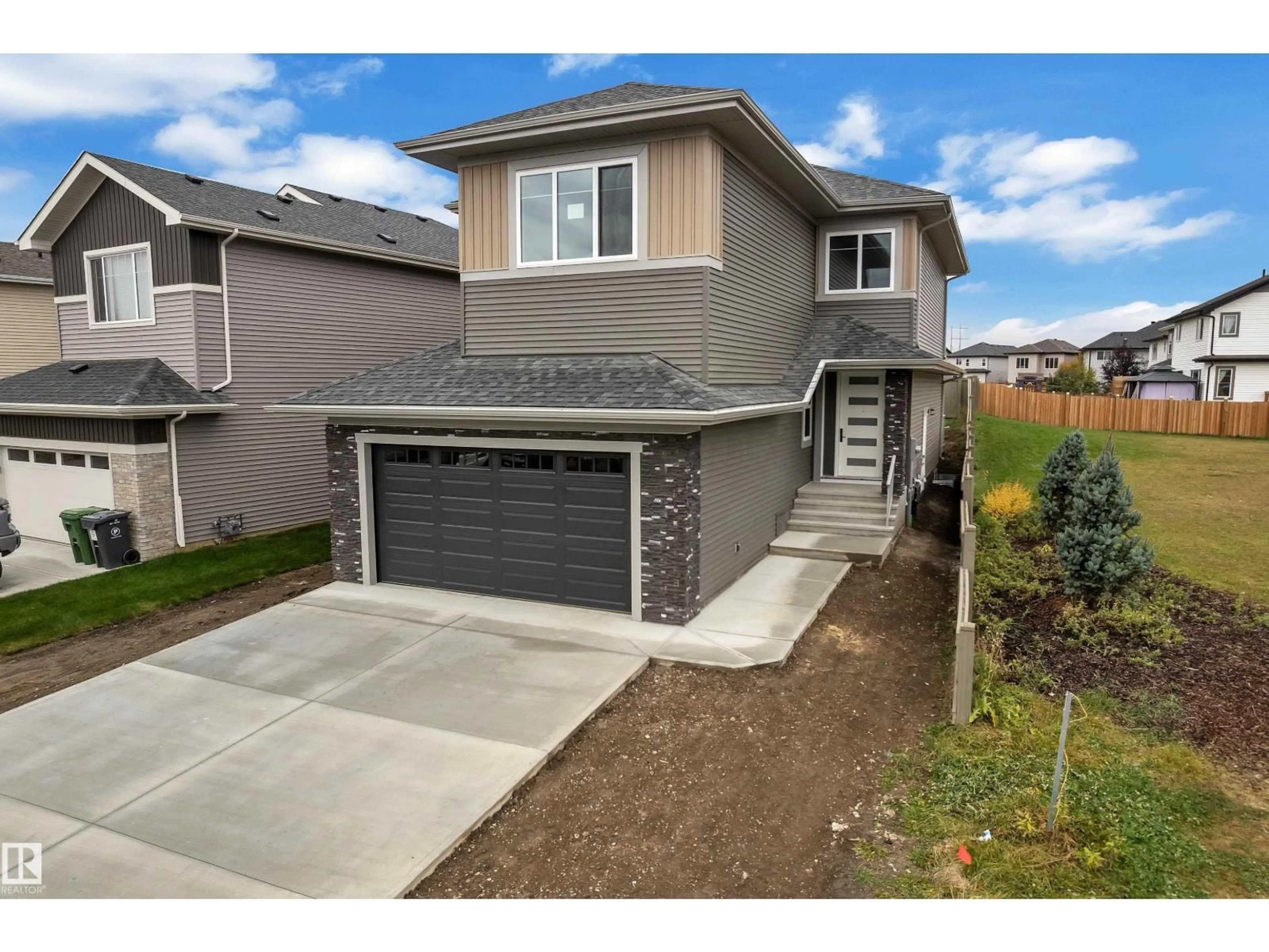 Home with vinyl exterior material, street for 717 ASTORIA WY, Devon Alberta T9G0M7