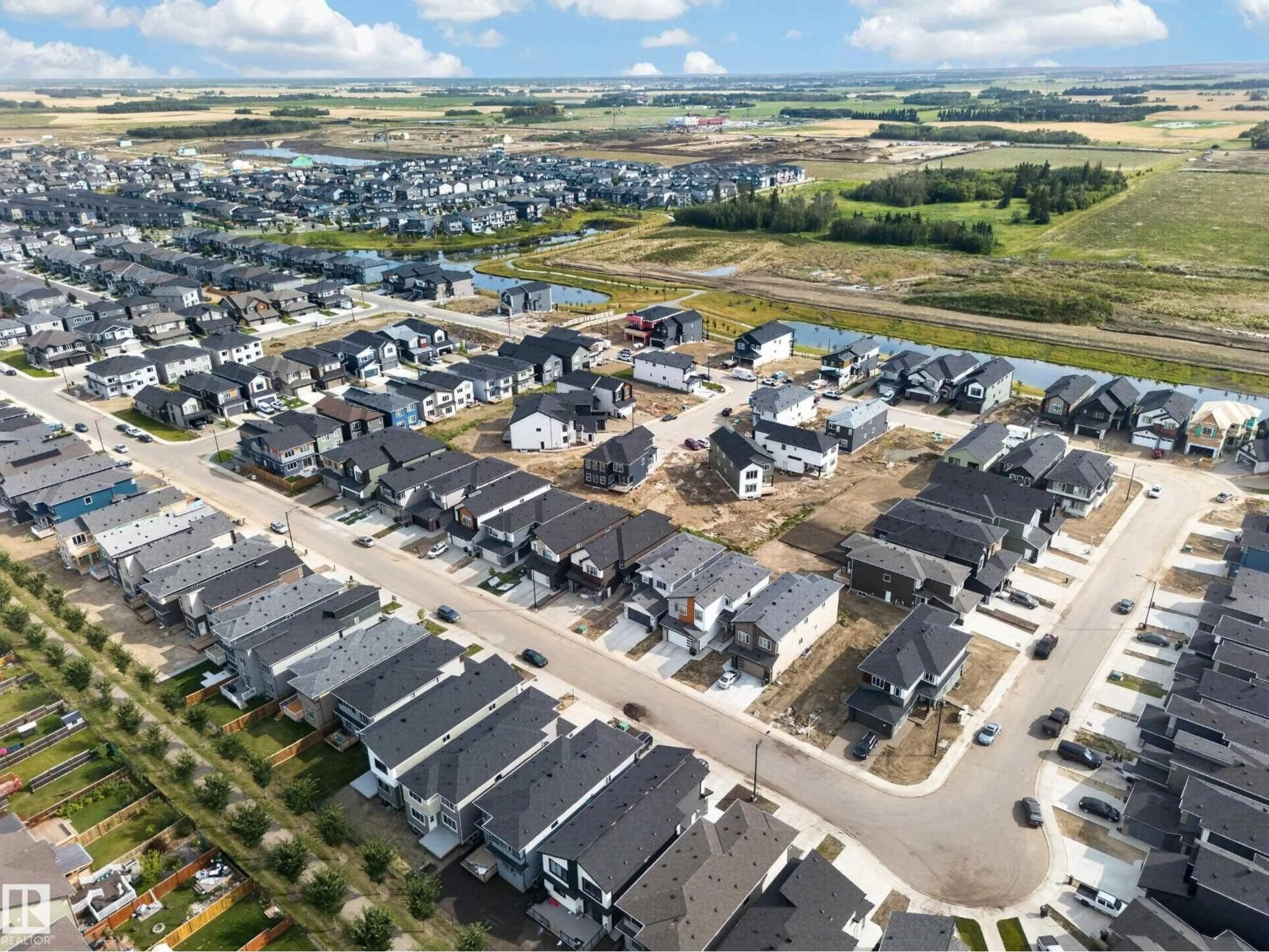 A pic from outside/outdoor area/front of a property/back of a property/a pic from drone, street for SW - 8418 MAYDAY LI, Edmonton Alberta T6X3G1