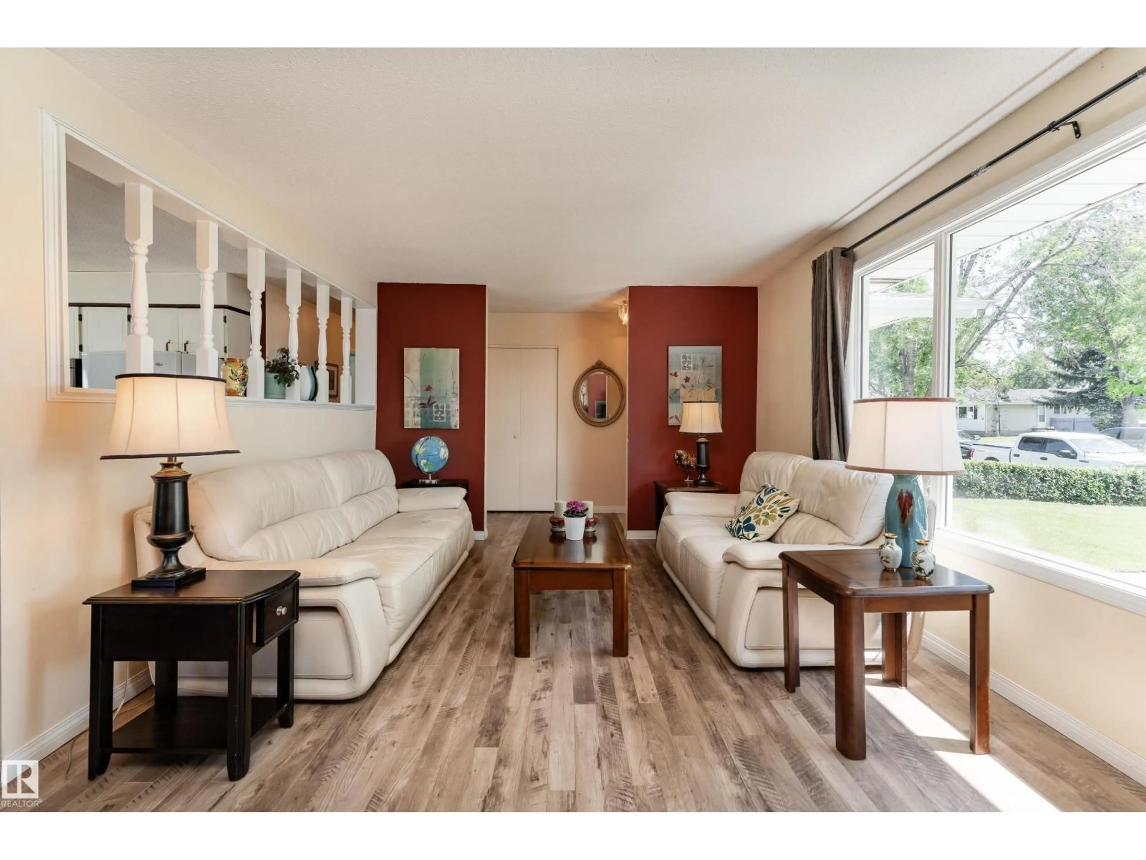 Living room with furniture, wood/laminate floor for 7 CAMELOT CR, Leduc Alberta T9E4L4