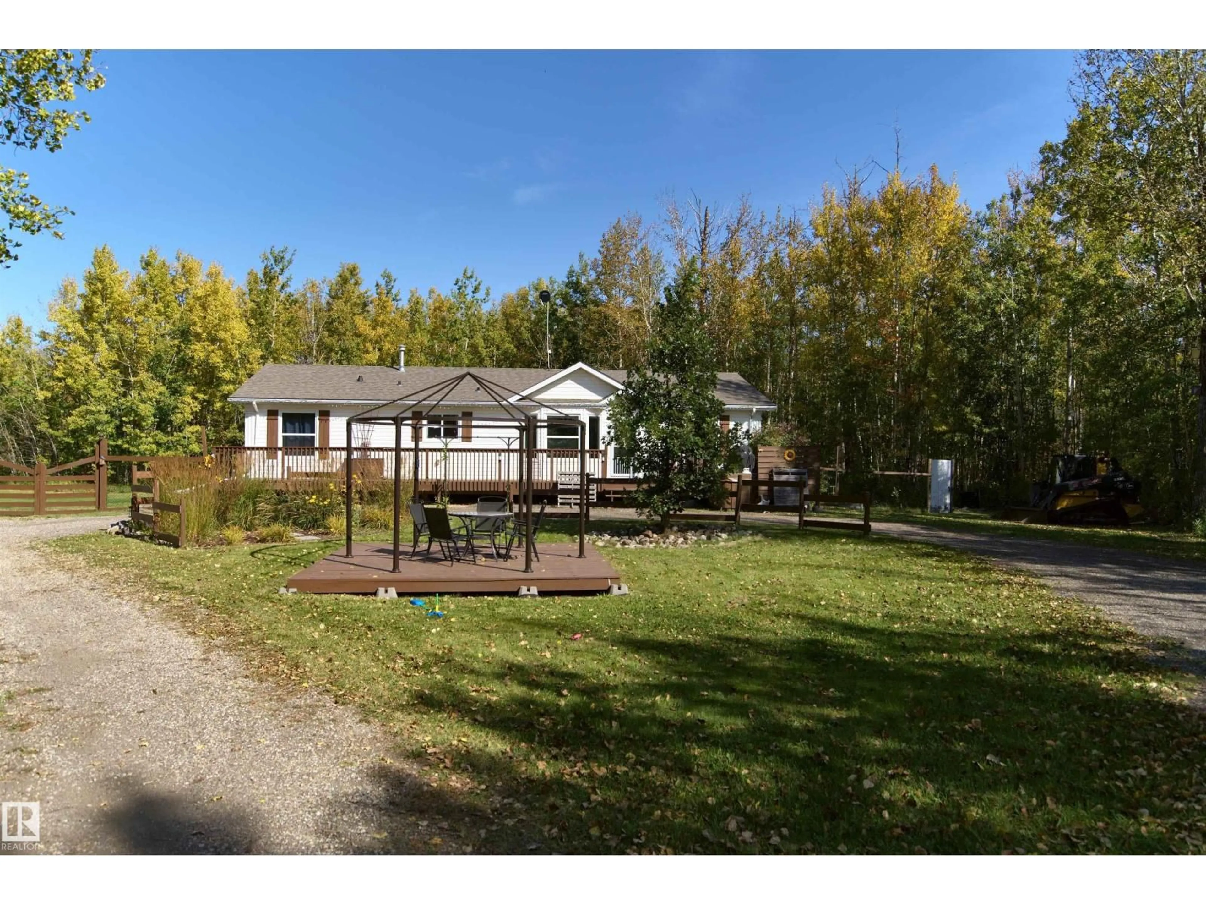 A pic from outside/outdoor area/front of a property/back of a property/a pic from drone, unknown for 480 21539 TWP RD 503, Rural Leduc County Alberta T0B3M2