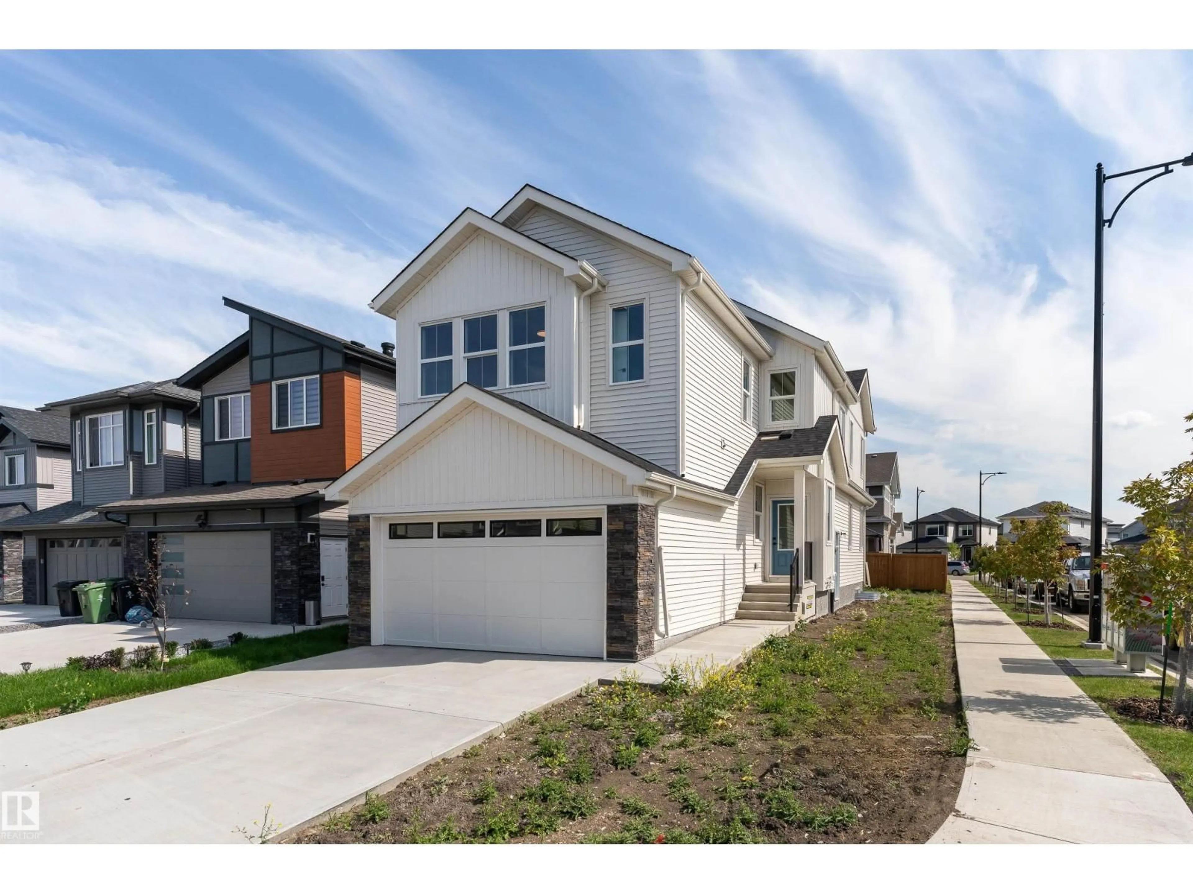 Home with vinyl exterior material, street for 294 ELLIOTT WD, Fort Saskatchewan Alberta T8L0V1