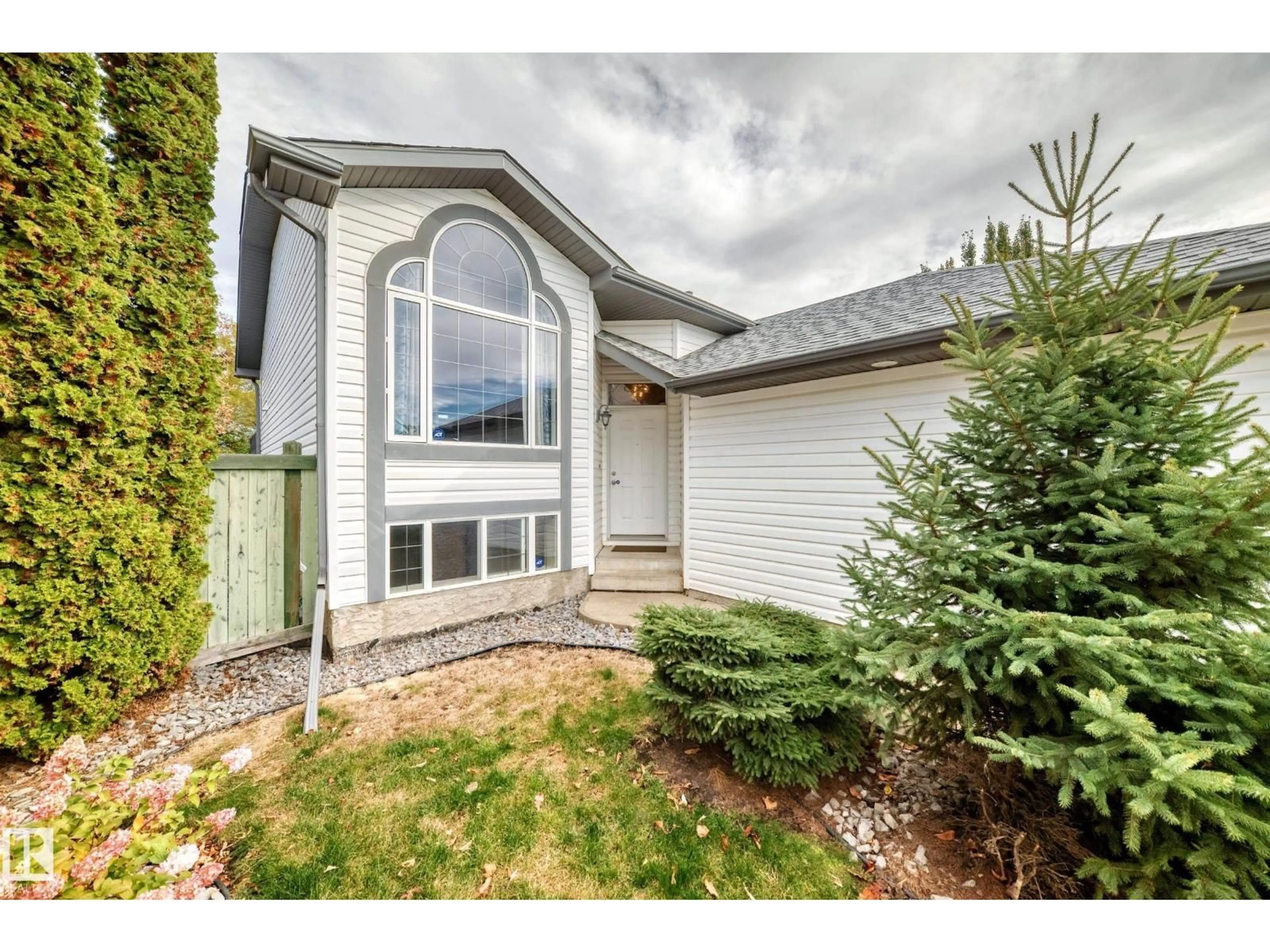 Home with vinyl exterior material, street for 21206 88A AV, Edmonton Alberta T5T6V2