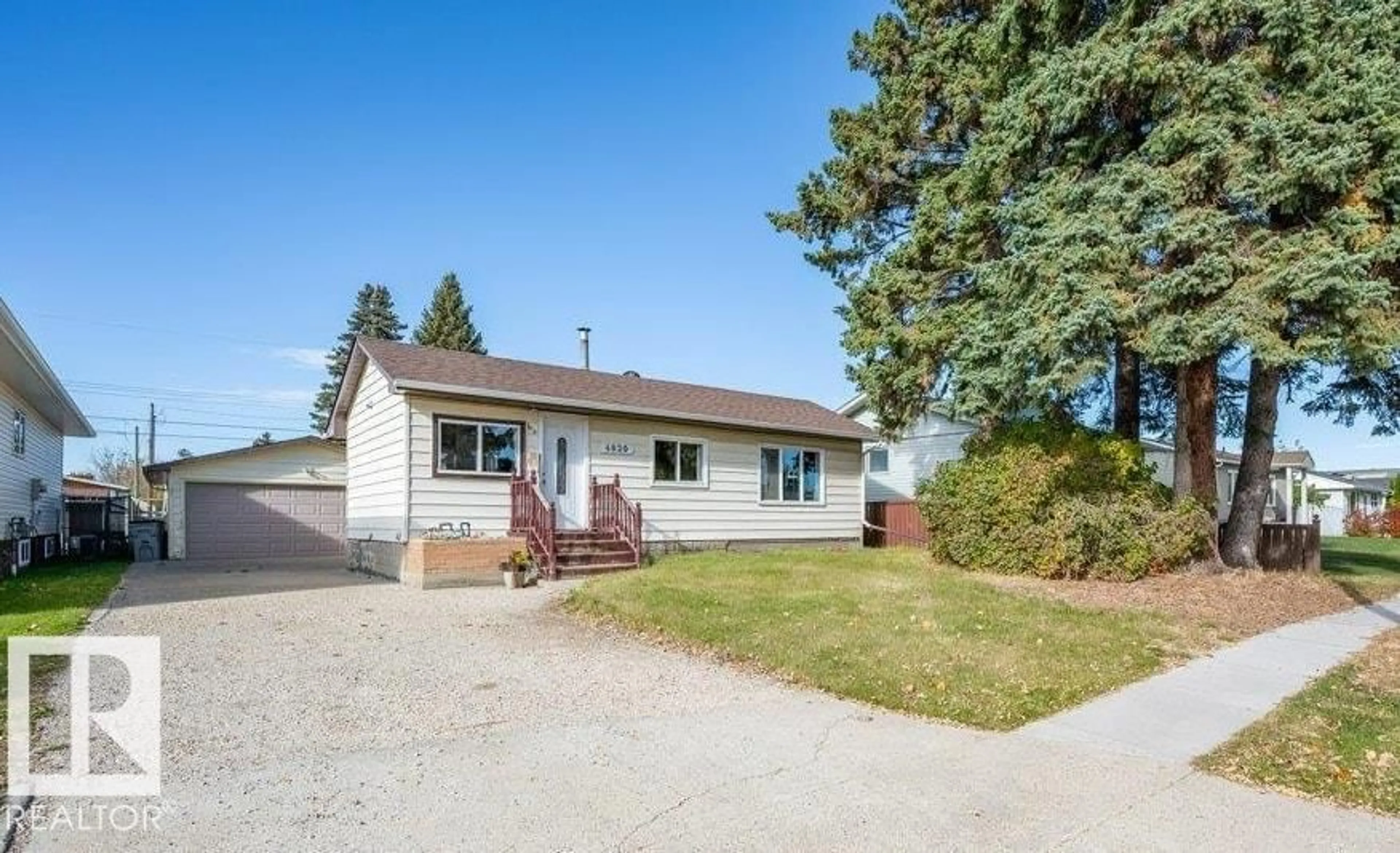 Home with vinyl exterior material, street for 4820 49 ST, Gibbons Alberta T0A1N0