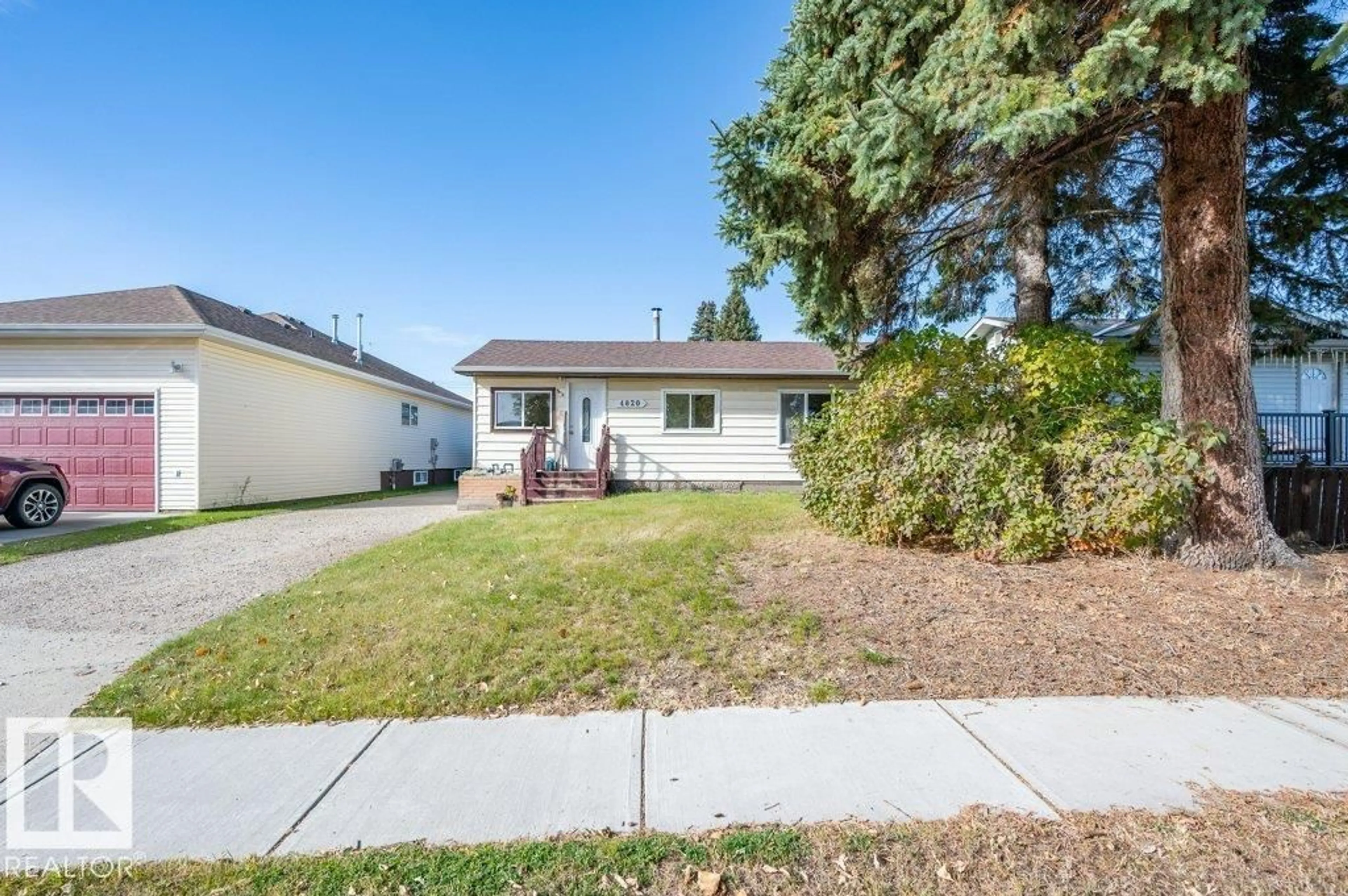 Home with vinyl exterior material, street for 4820 49 ST, Gibbons Alberta T0A1N0