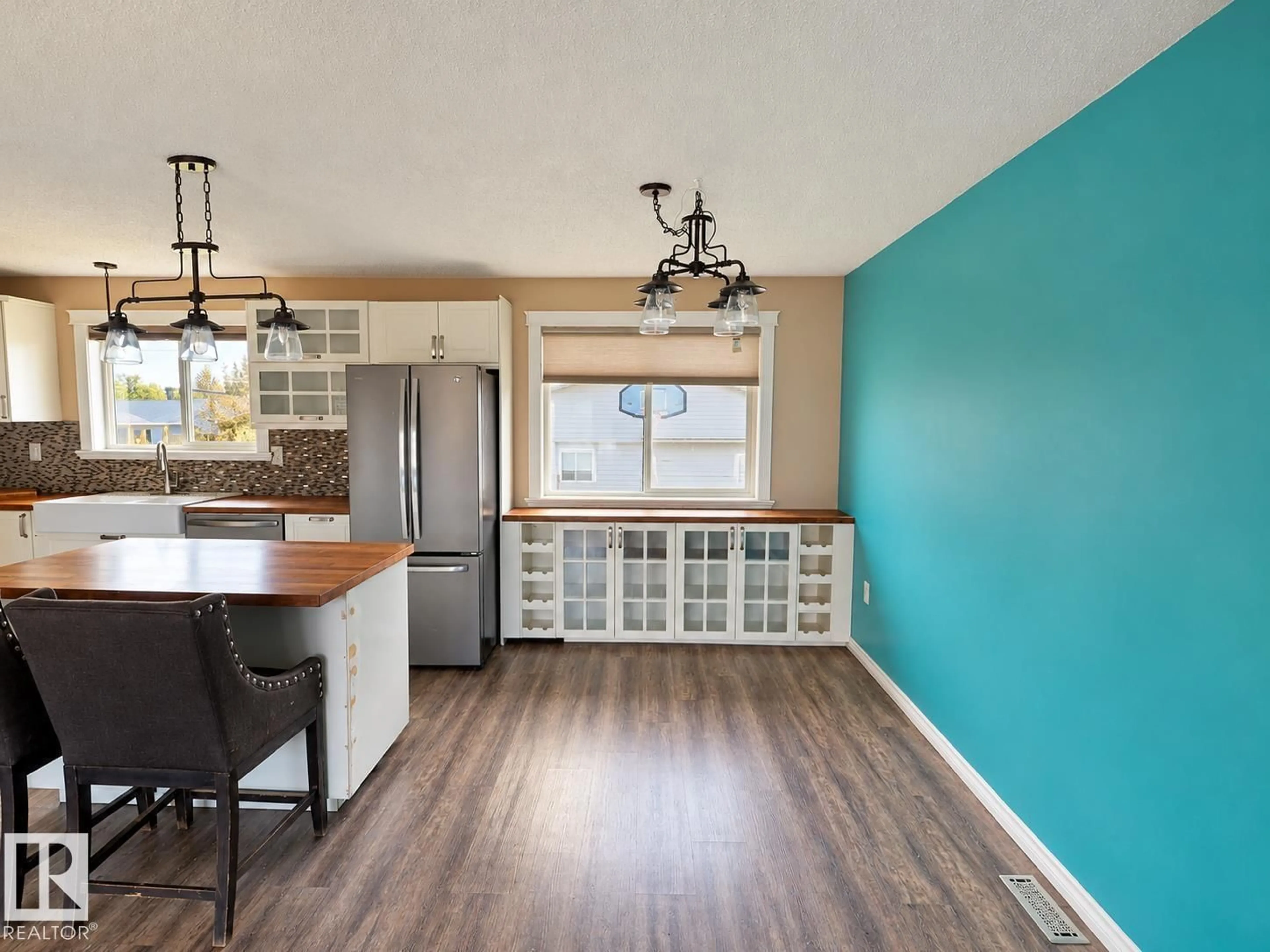 Open concept kitchen, wood/laminate floor for 5919 53 AVE, Vermilion Alberta T9X1M1