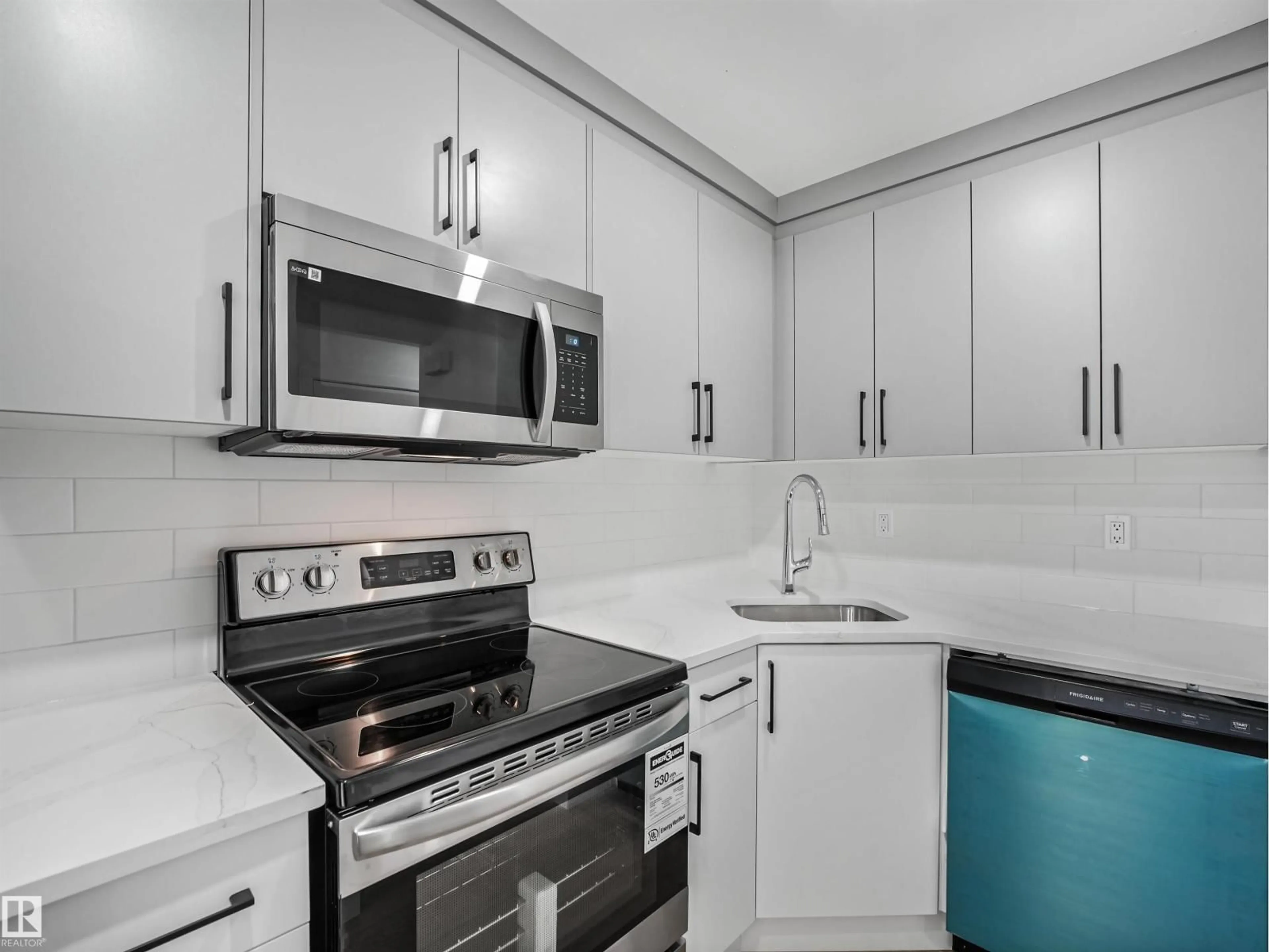 Standard kitchen, ceramic/tile floor for NW - 2345 139 AV, Edmonton Alberta T5Y1S1