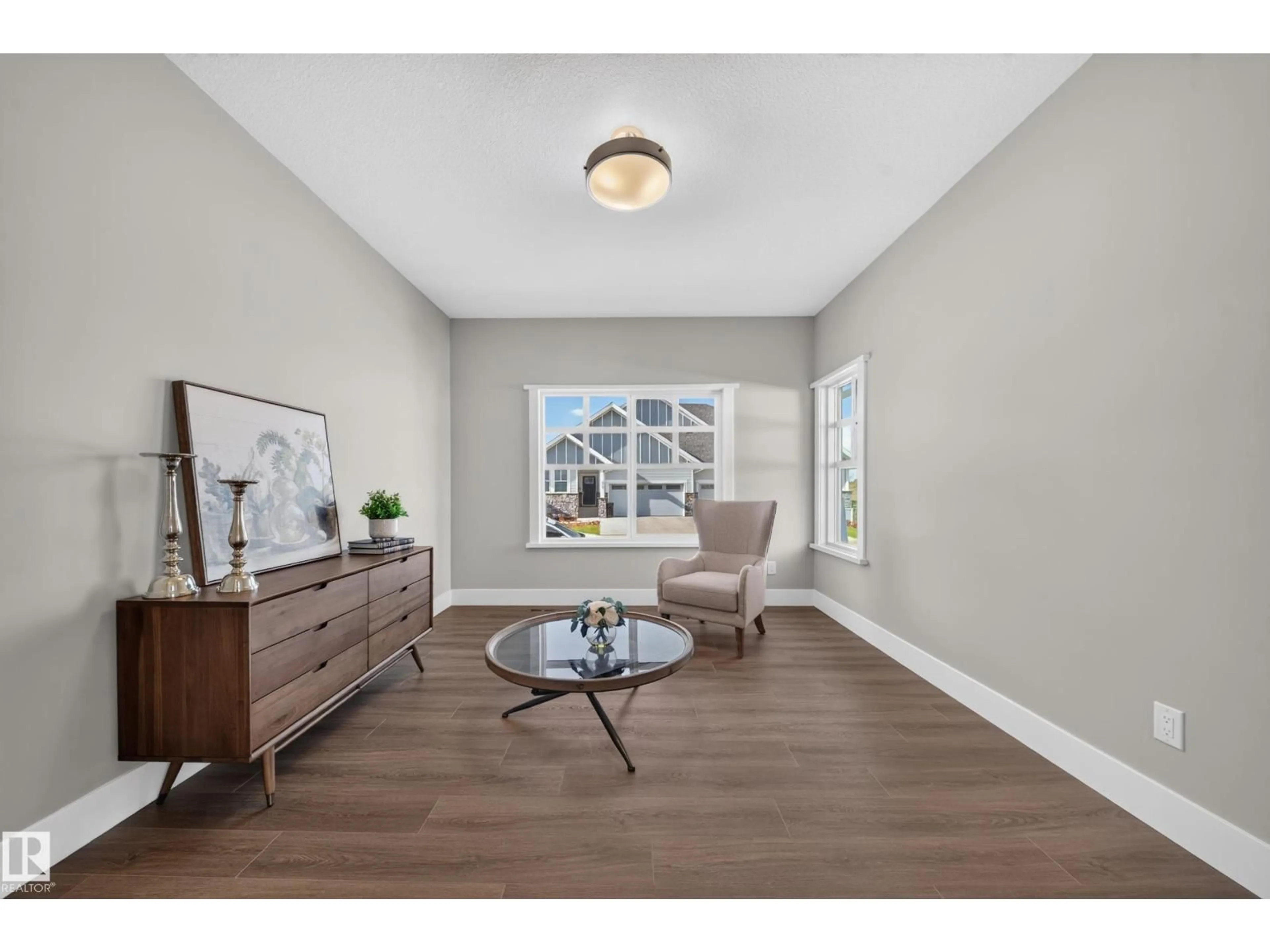 Living room with furniture, wood/laminate floor for #13 - 120 HILLSHIRE BV, Sherwood Park Alberta T8B0C9