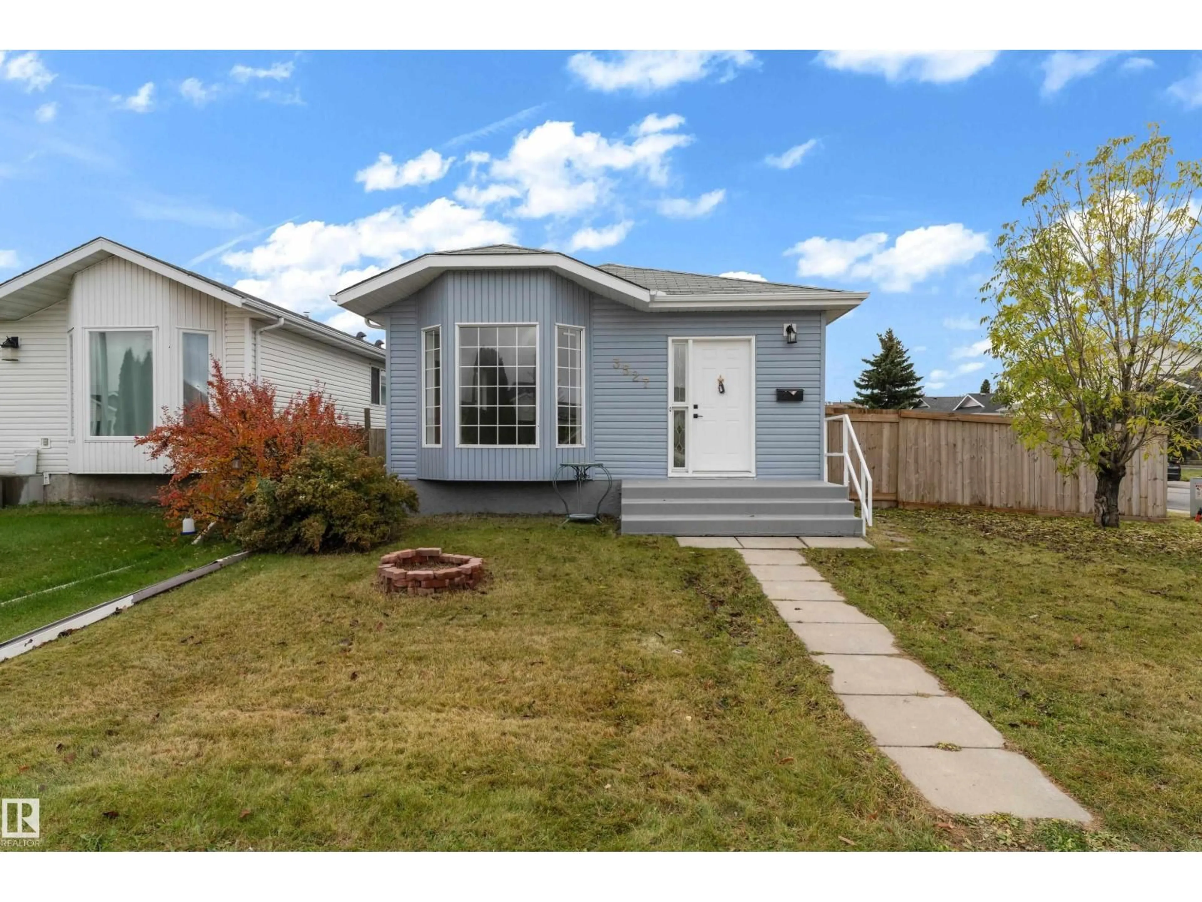 Home with vinyl exterior material, street for 3527 44A AV NW, Edmonton Alberta T6L6K6
