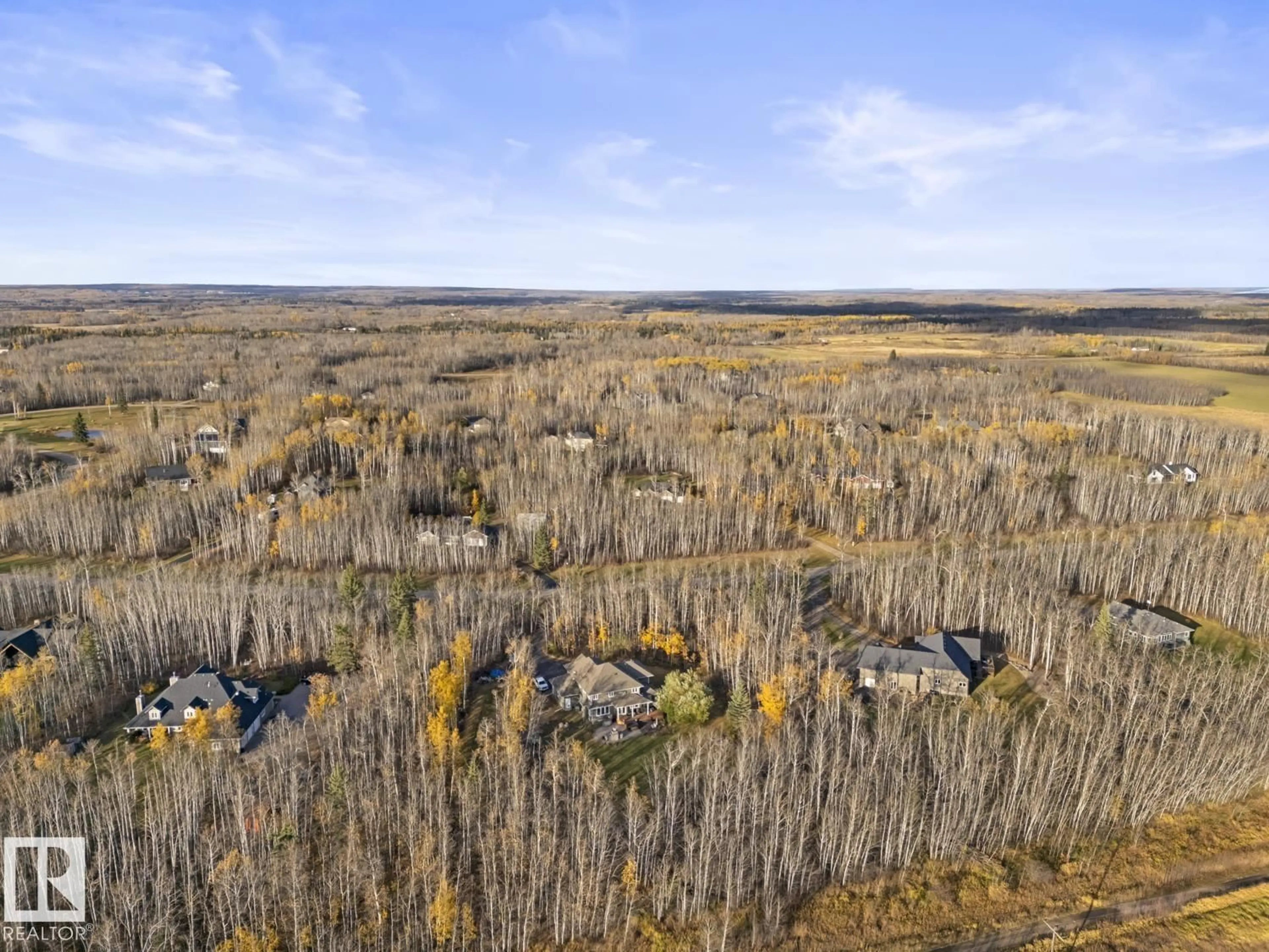 A pic from outside/outdoor area/front of a property/back of a property/a pic from drone, forest/trees view for 11 - 63220 RR 433, Rural Bonnyville M.D. Alberta T9M1N1