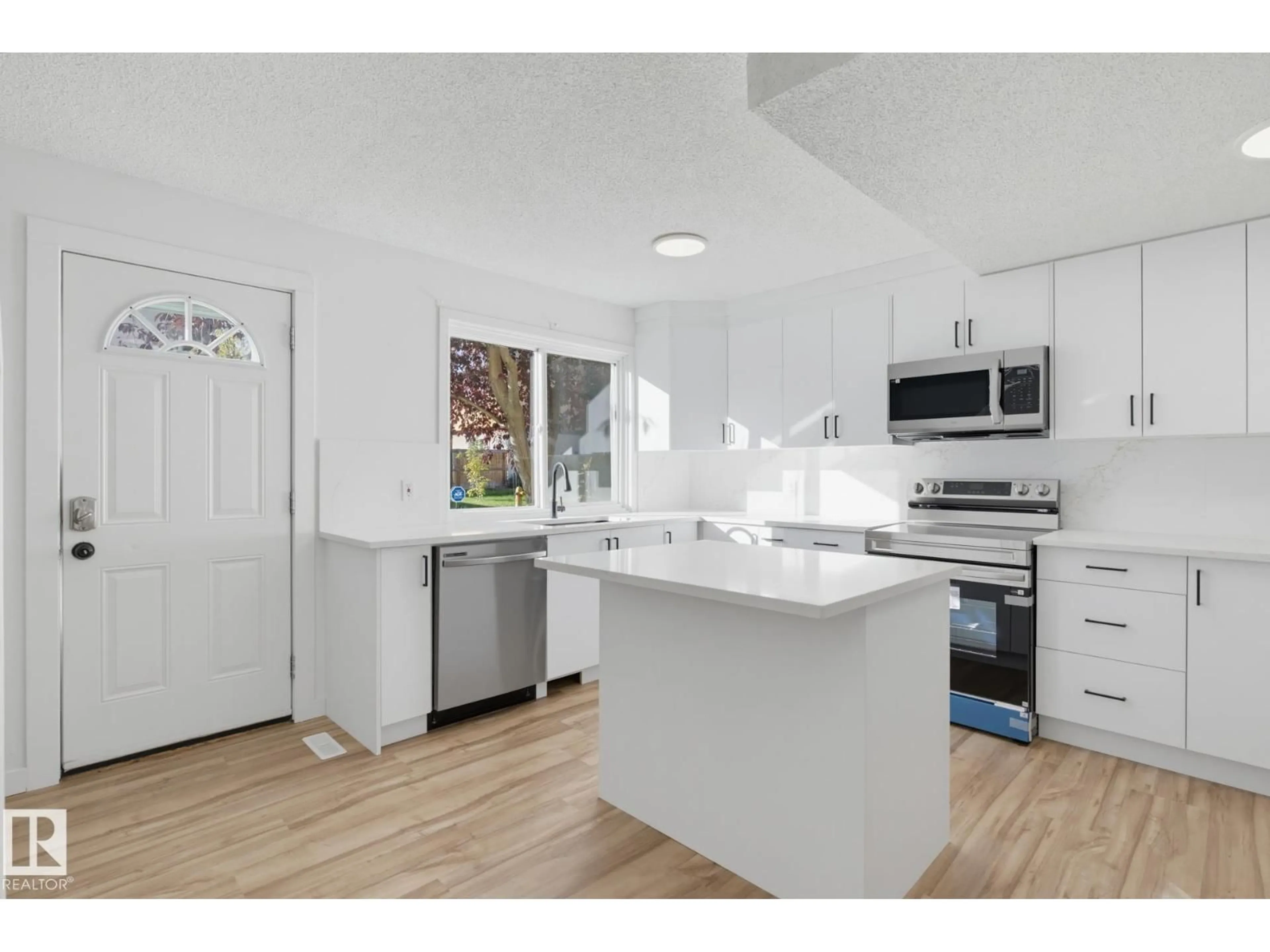 Open concept kitchen, unknown for 133 WOODSTOCK NW, Edmonton Alberta T5T0H6