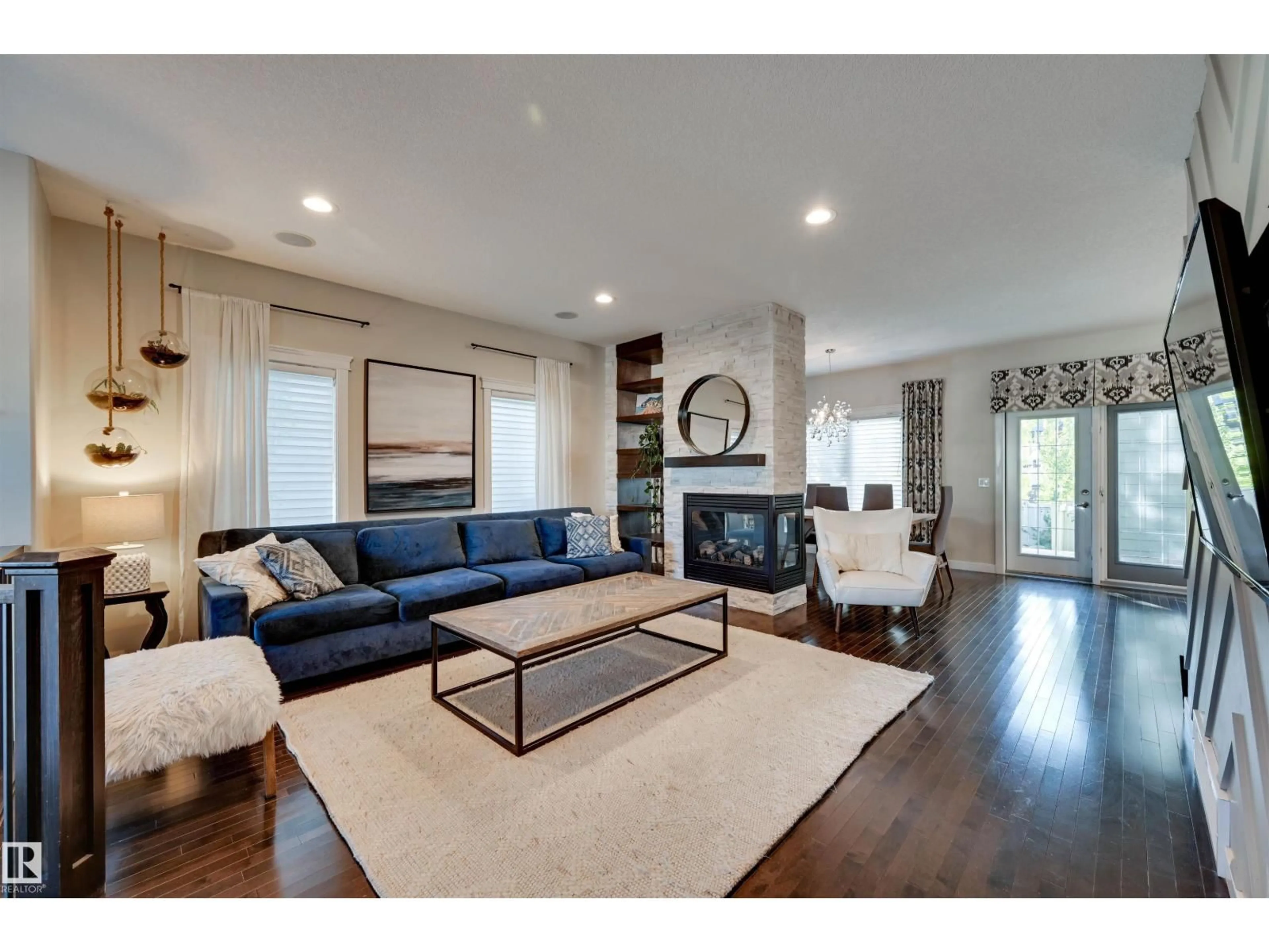 Living room with furniture, wood/laminate floor for 2327 FREZENBERG AV, Edmonton Alberta T5E4Z1