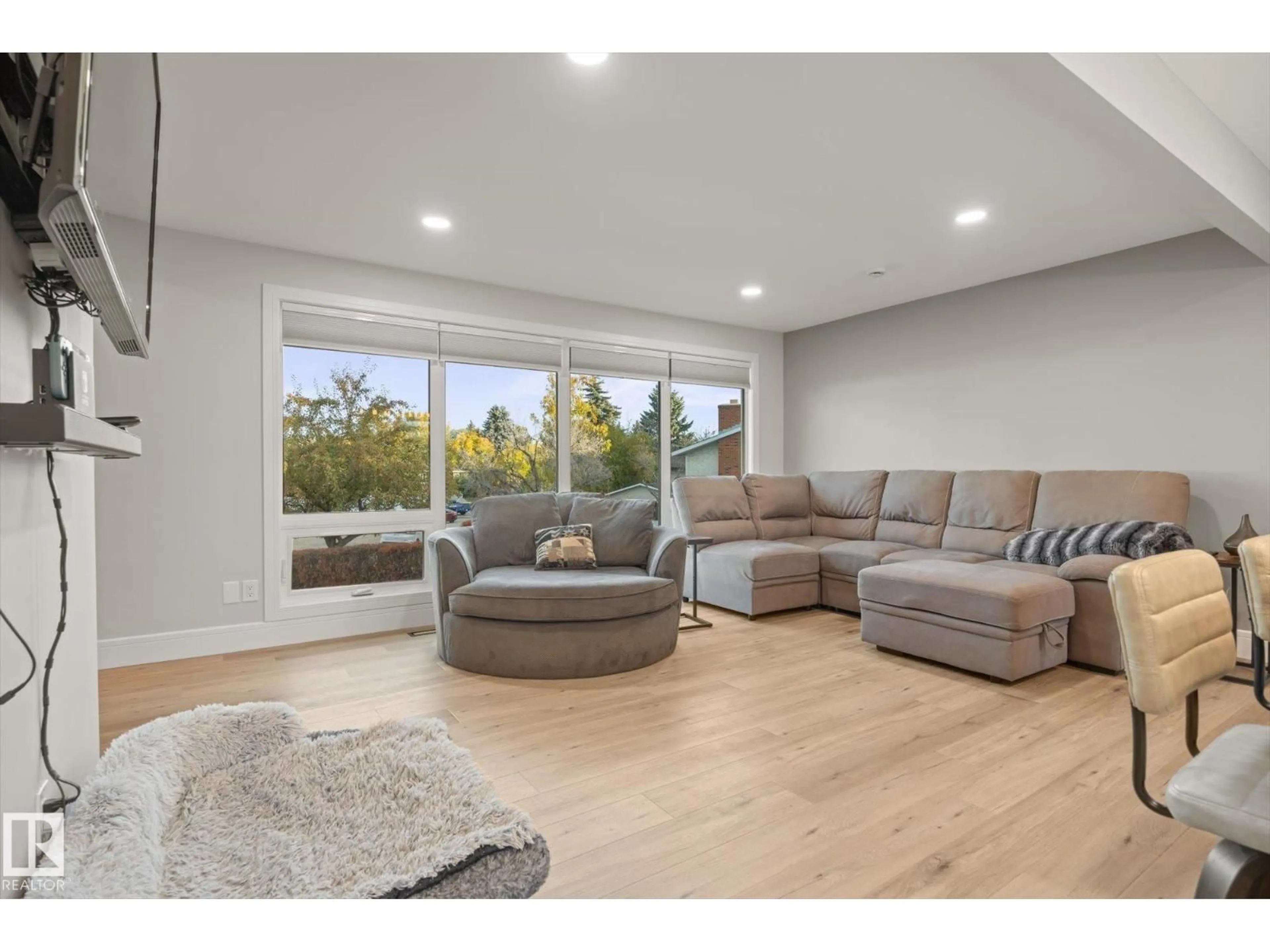 Living room with furniture, wood/laminate floor for 313 GREYSTONE PL, Sherwood Park Alberta T8A3E9