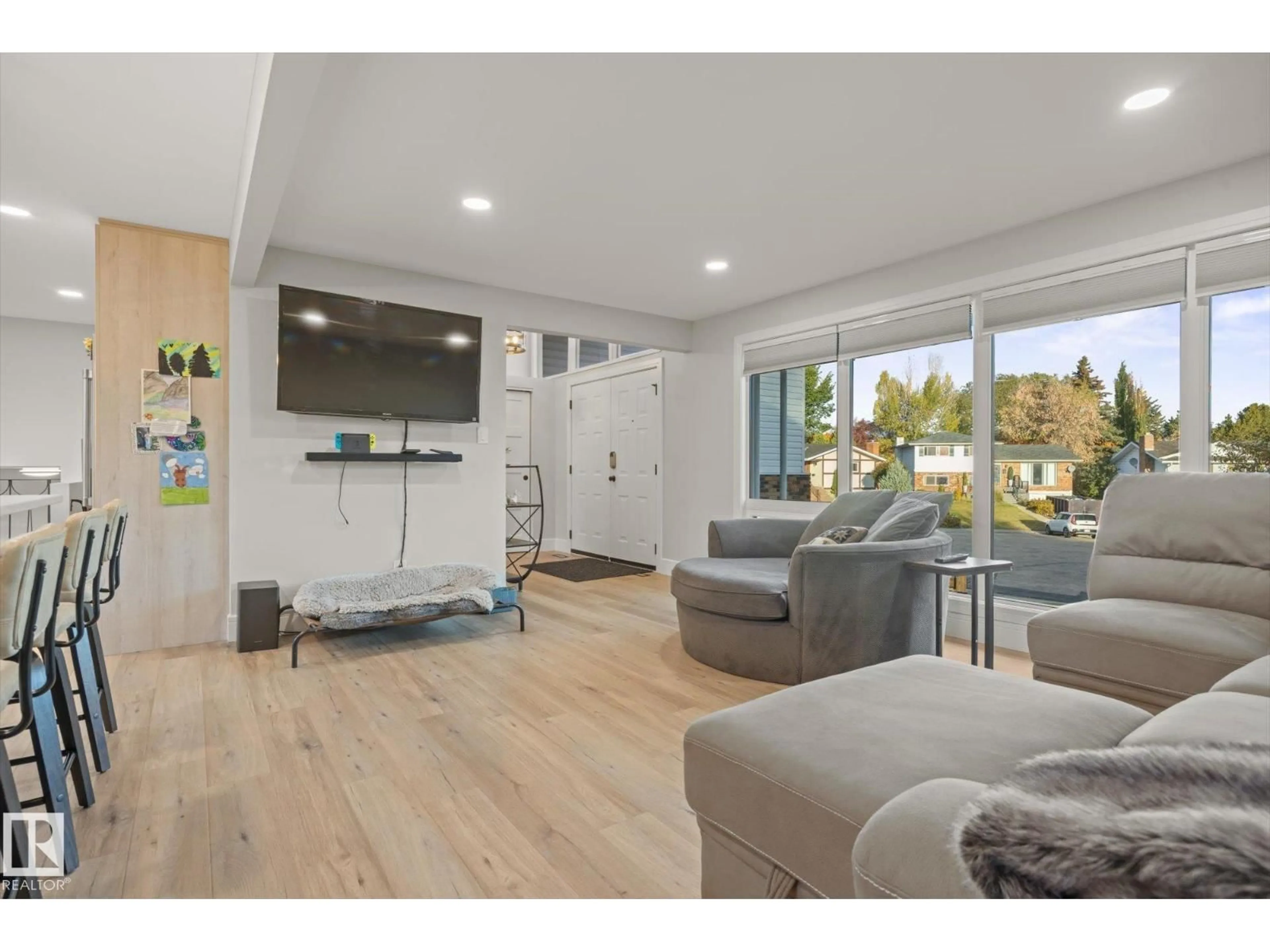 Living room with furniture, wood/laminate floor for 313 GREYSTONE PL, Sherwood Park Alberta T8A3E9