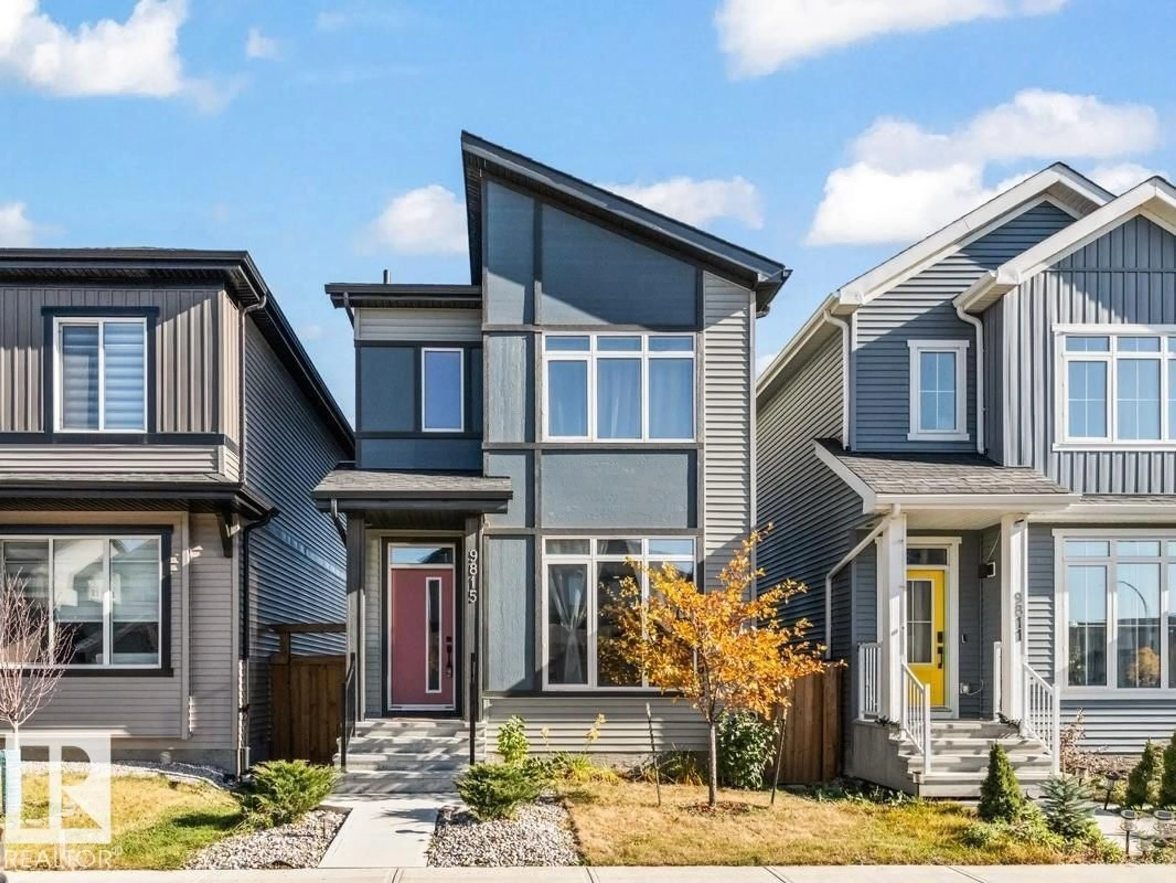 Home with vinyl exterior material, street for 9815 227 ST, Edmonton Alberta T5T7T9