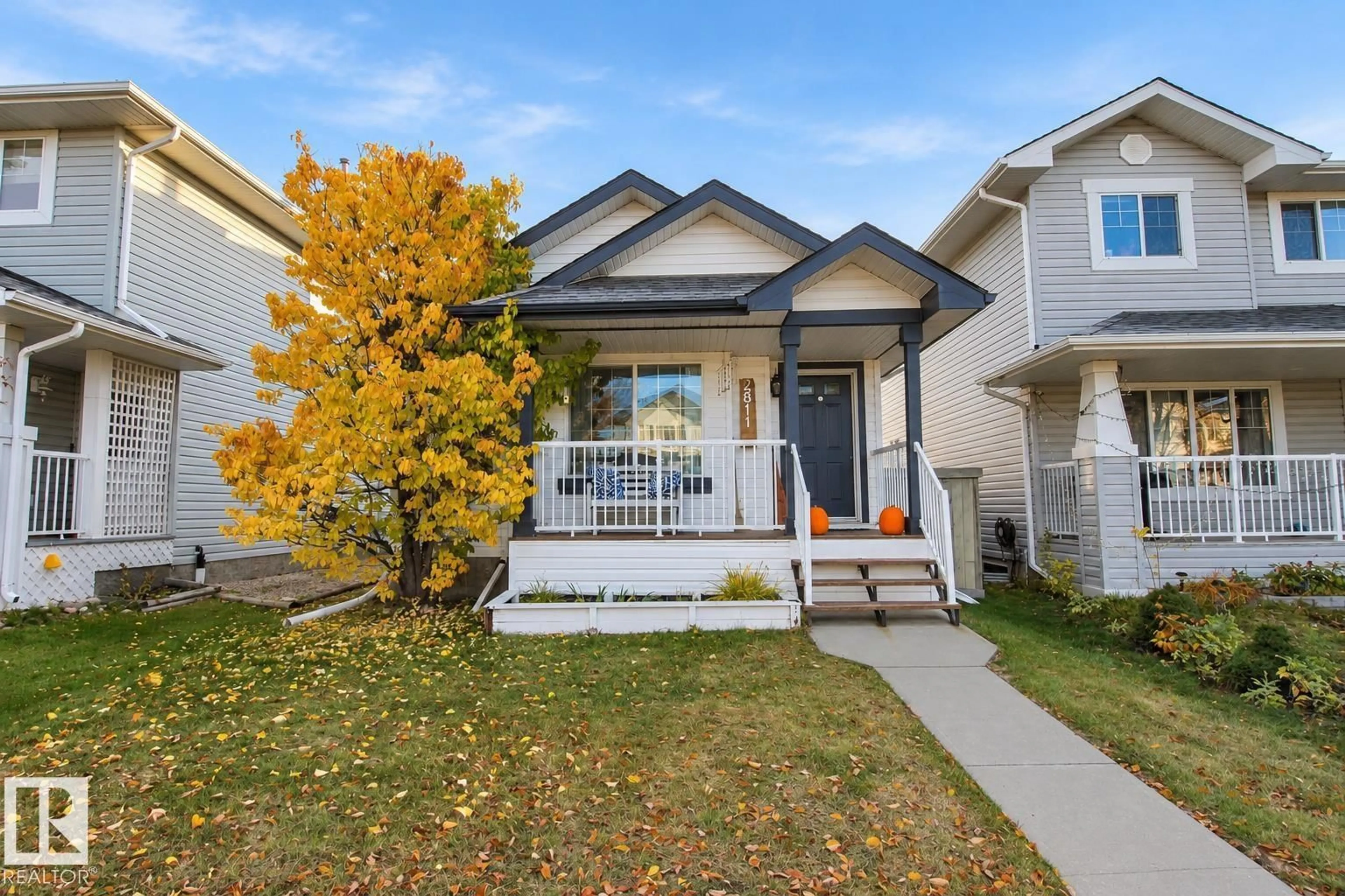 Home with vinyl exterior material, street for 2811 25 ST, Edmonton Alberta T6T2A3