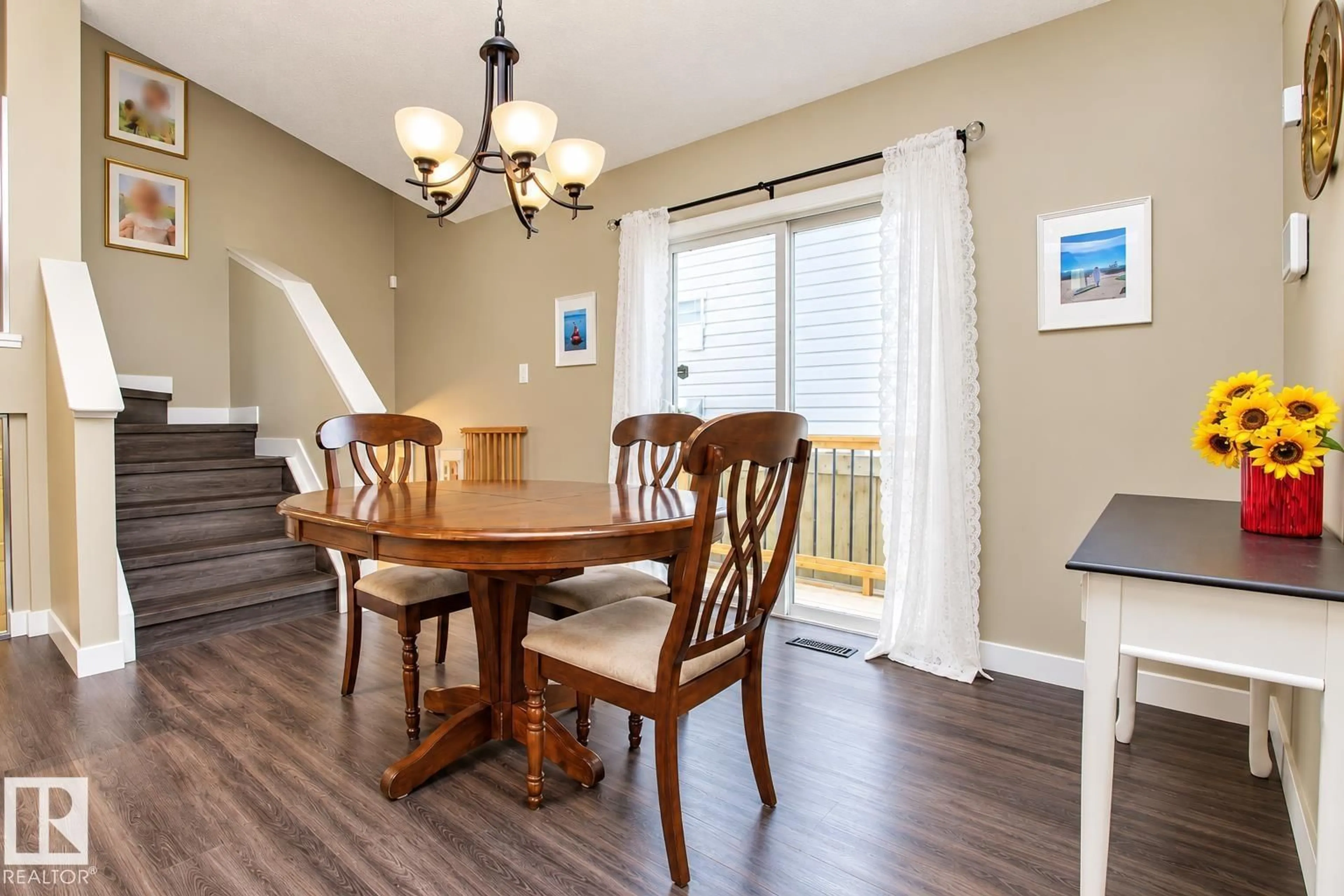 Dining room, wood/laminate floor for 2811 25 ST, Edmonton Alberta T6T2A3