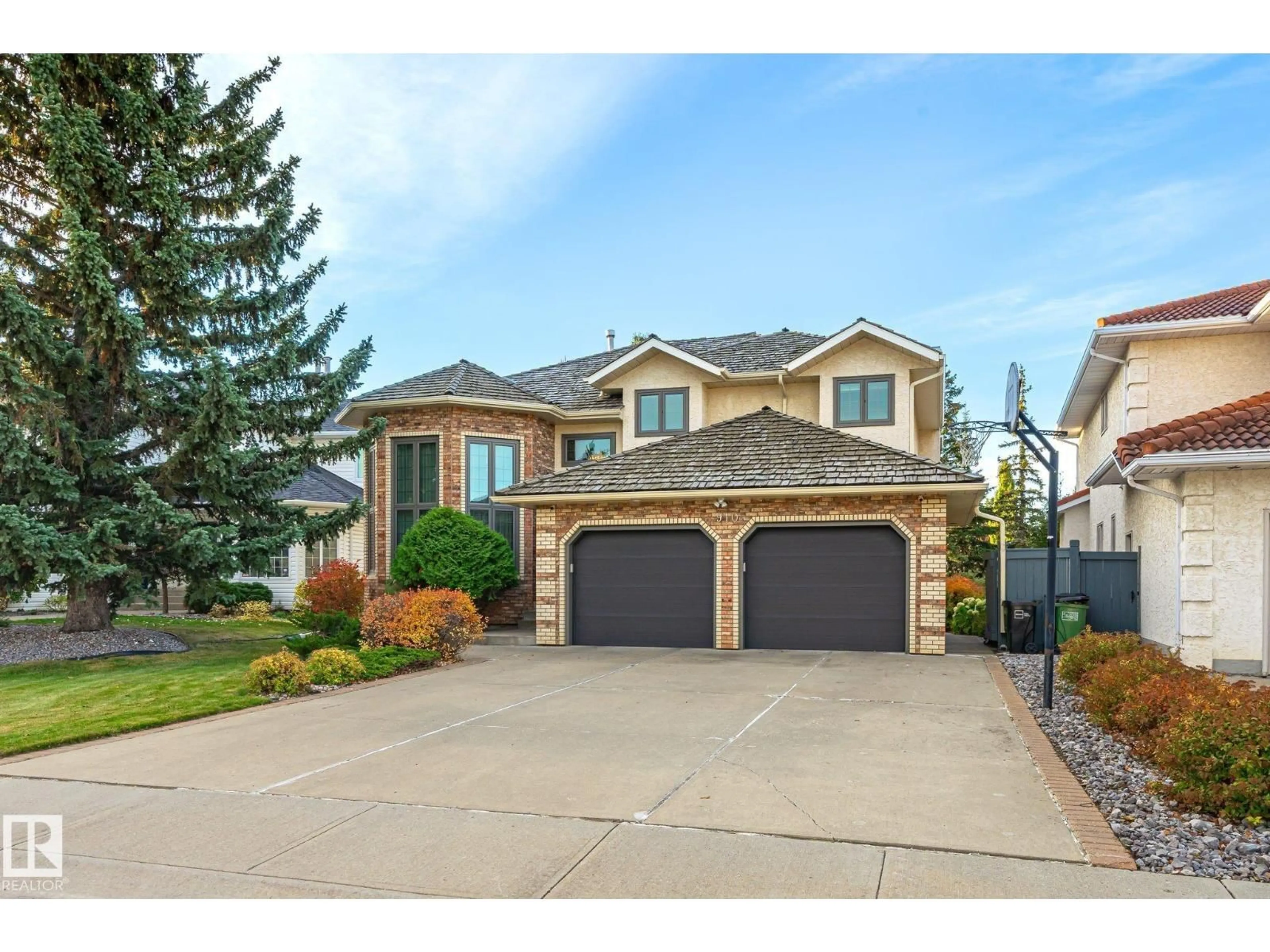 Home with brick exterior material, street for 910 WALLBRIDGE PL, Edmonton Alberta T6M2L7