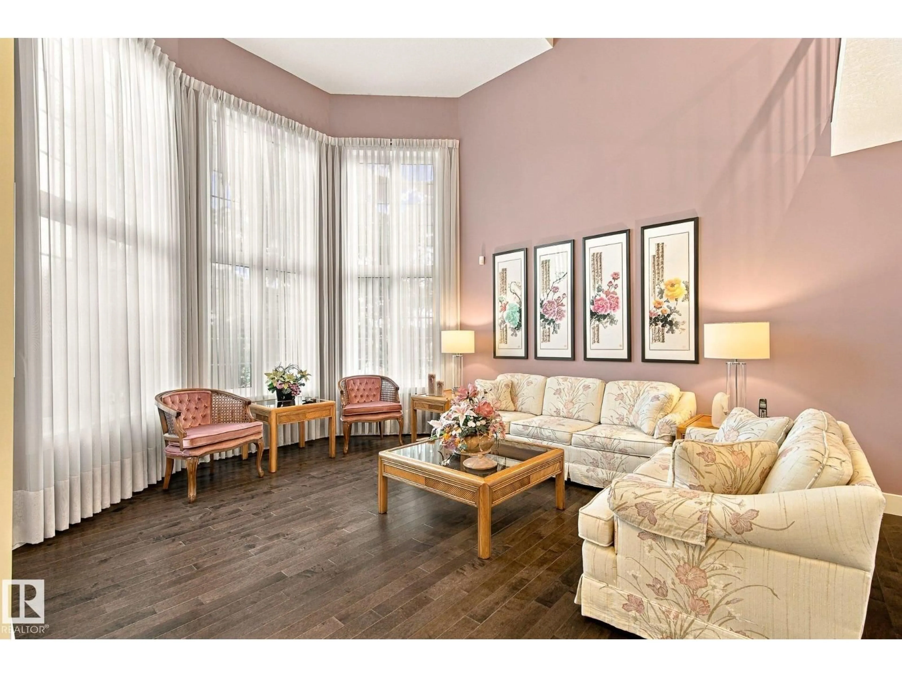 Living room with furniture, wood/laminate floor for 910 WALLBRIDGE PL, Edmonton Alberta T6M2L7