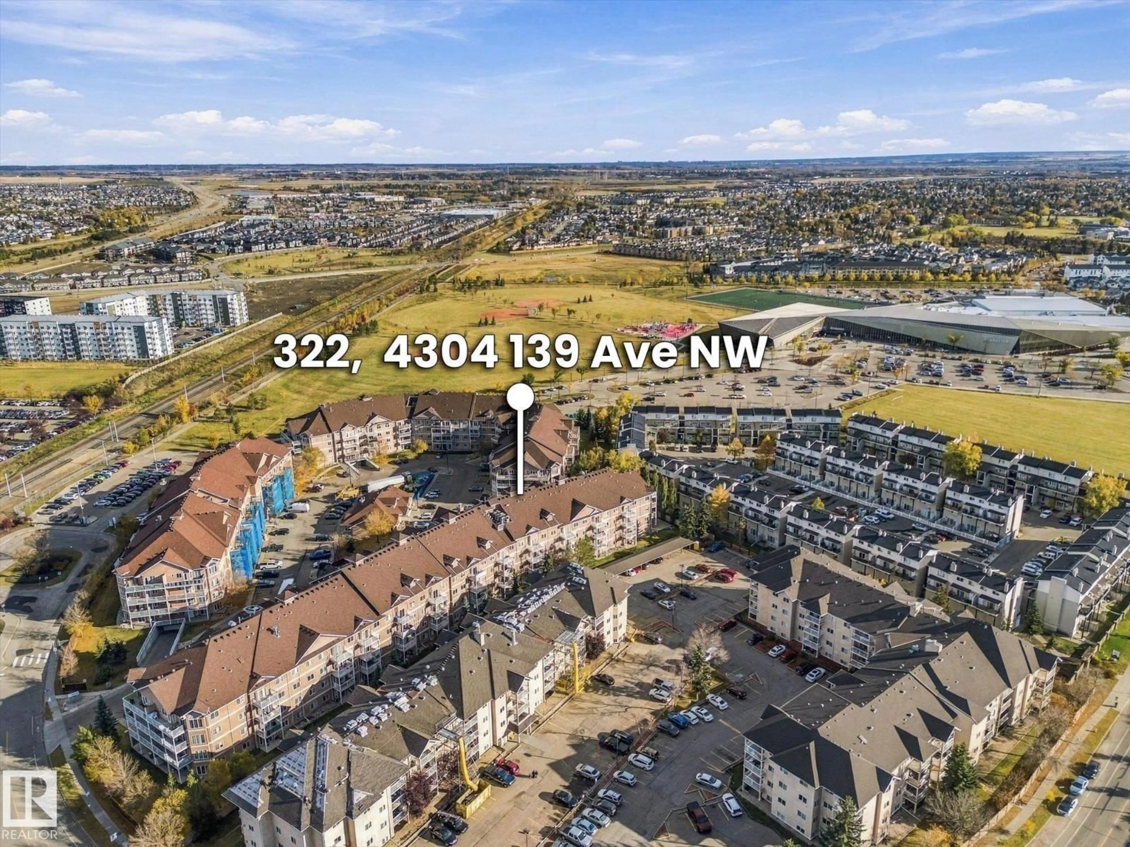 A pic from outside/outdoor area/front of a property/back of a property/a pic from drone, water/lake/river/ocean view for #322 - 4304 139 AV, Edmonton Alberta T5Y0H6