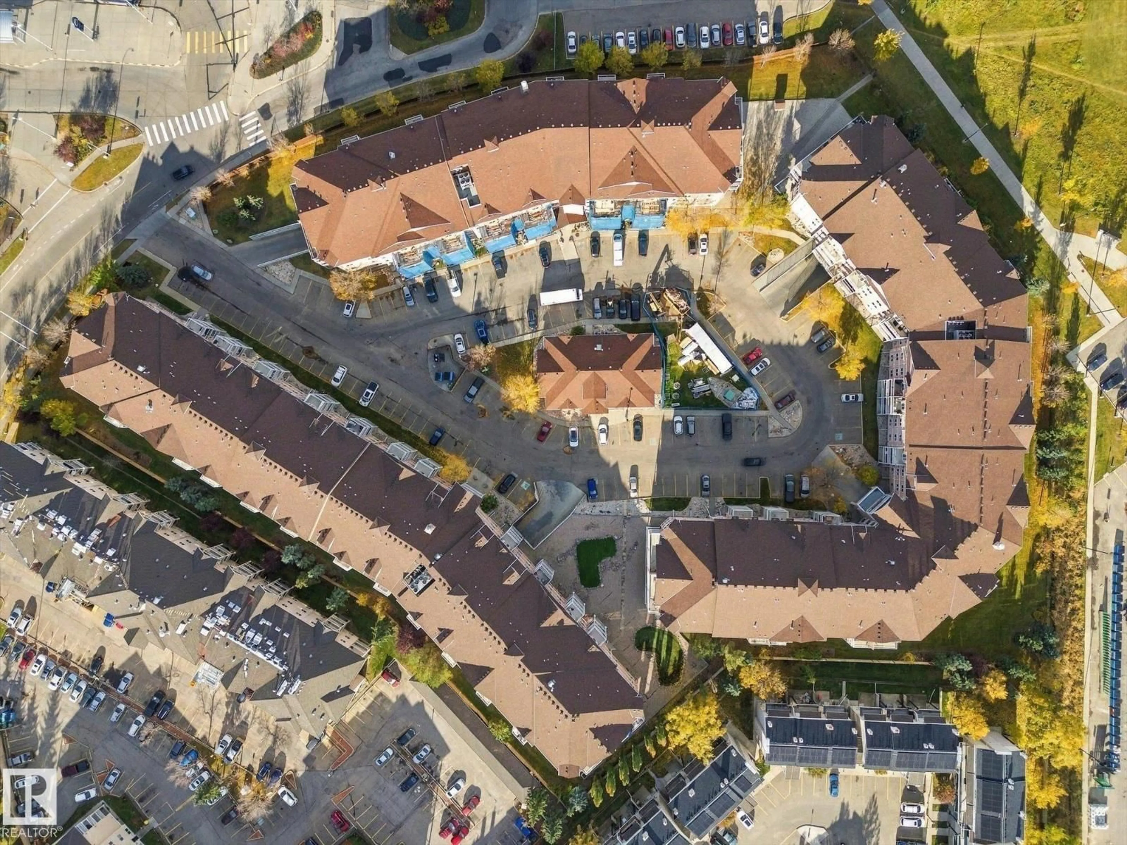 A pic from outside/outdoor area/front of a property/back of a property/a pic from drone, street for #322 - 4304 139 AV, Edmonton Alberta T5Y0H6