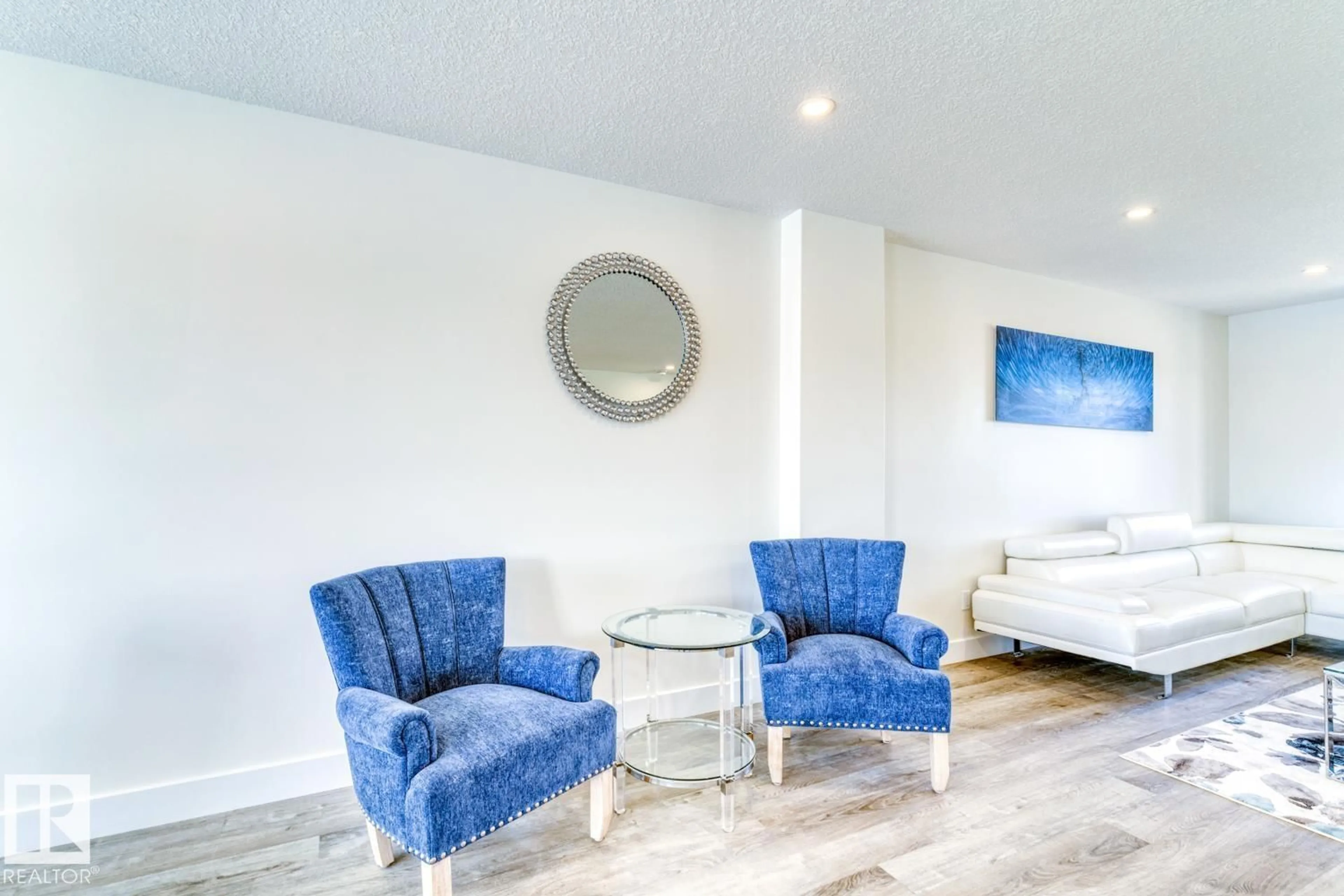 Living room with furniture, wood/laminate floor for 9250 156 AV, Edmonton Alberta T5Z3N7