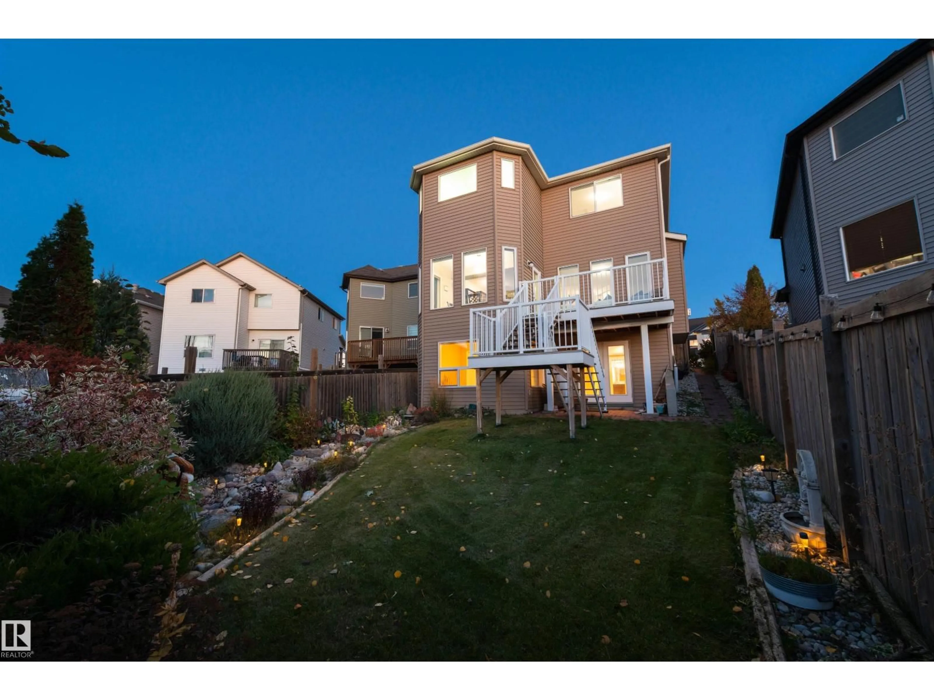 A pic from outside/outdoor area/front of a property/back of a property/a pic from drone, street for 5932 12 AV, Edmonton Alberta T6X0M7