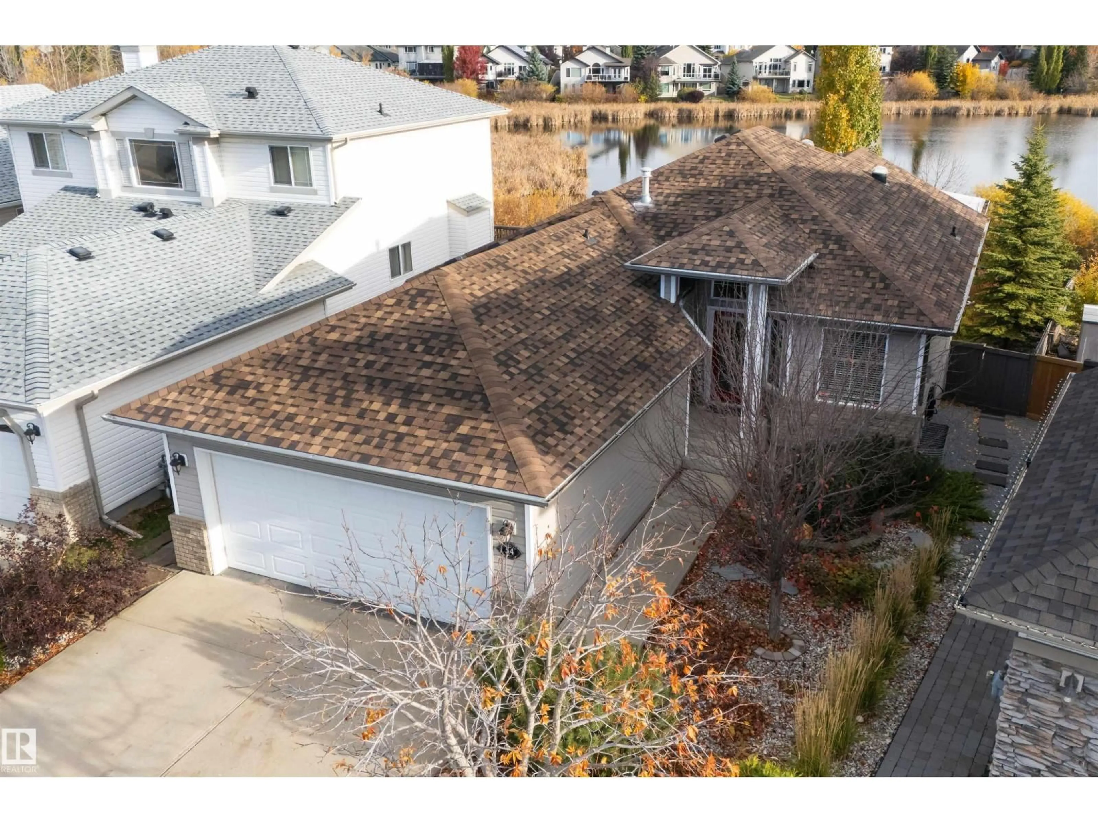 A pic from outside/outdoor area/front of a property/back of a property/a pic from drone, street for 54 FOXHAVEN WY, Sherwood Park Alberta T8H1N3
