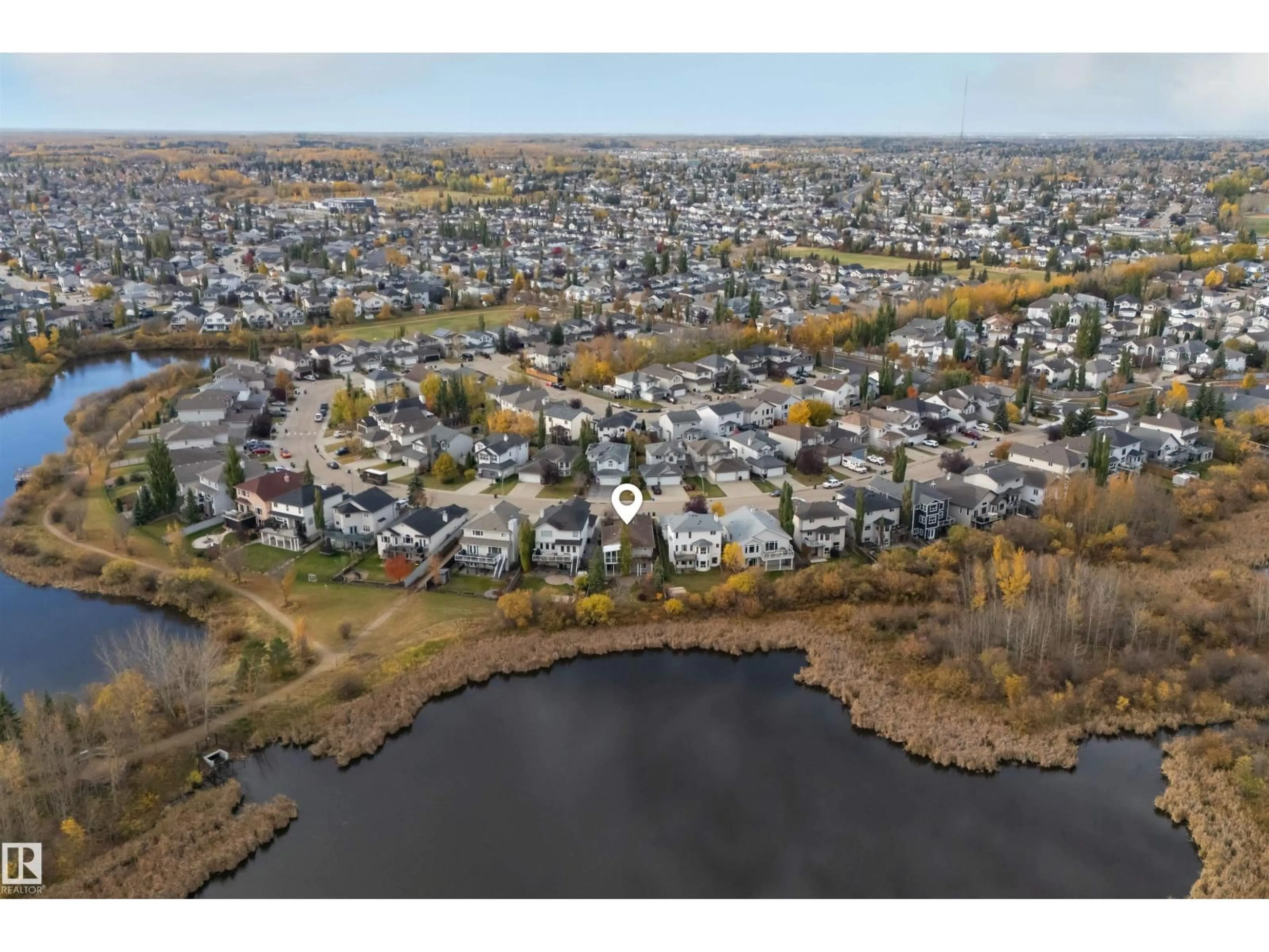 A pic from outside/outdoor area/front of a property/back of a property/a pic from drone, water/lake/river/ocean view for 54 FOXHAVEN WY, Sherwood Park Alberta T8H1N3