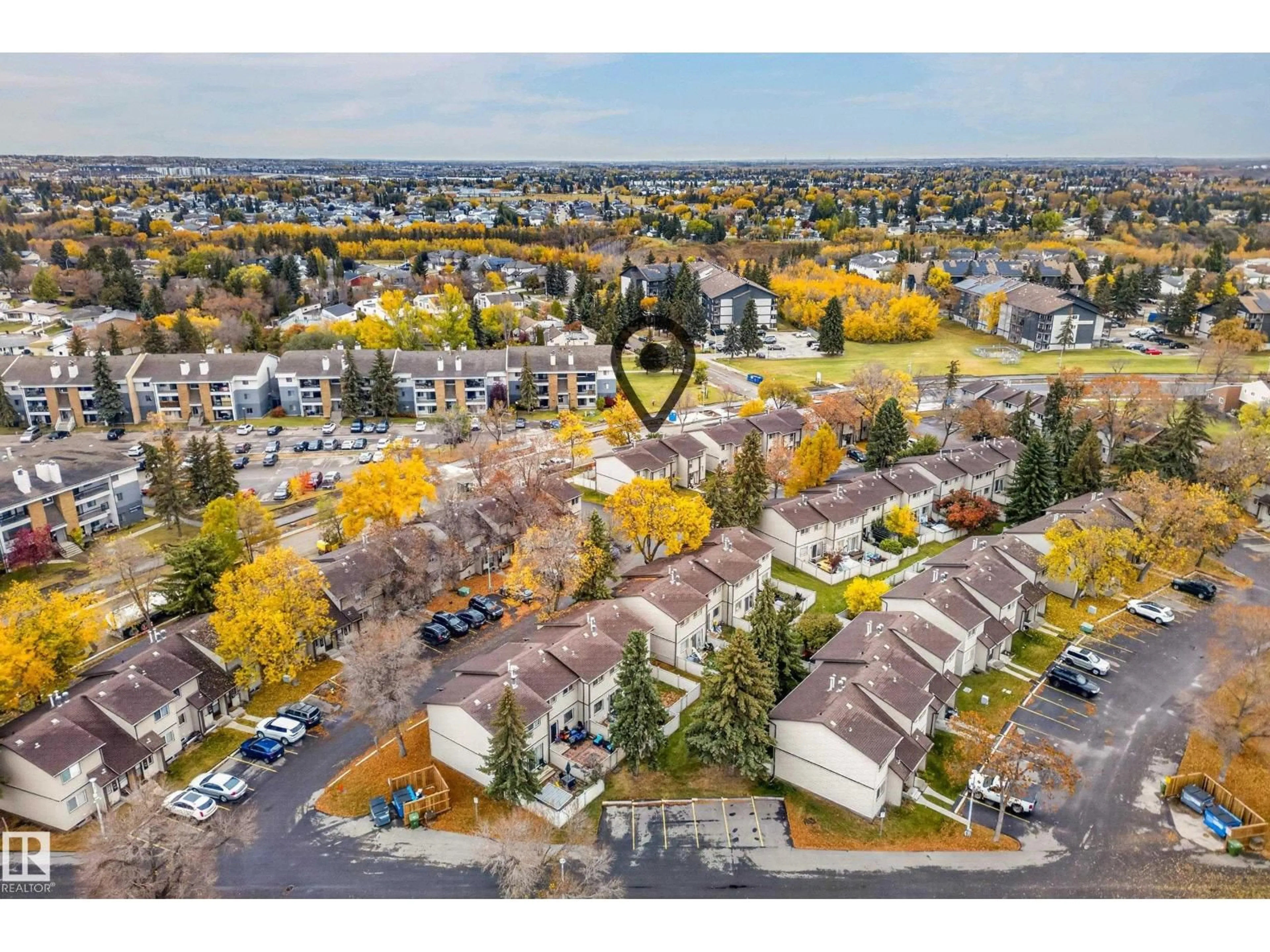 A pic from outside/outdoor area/front of a property/back of a property/a pic from drone, mountain view for 1209 HOOKE RD, Edmonton Alberta T5A4A5