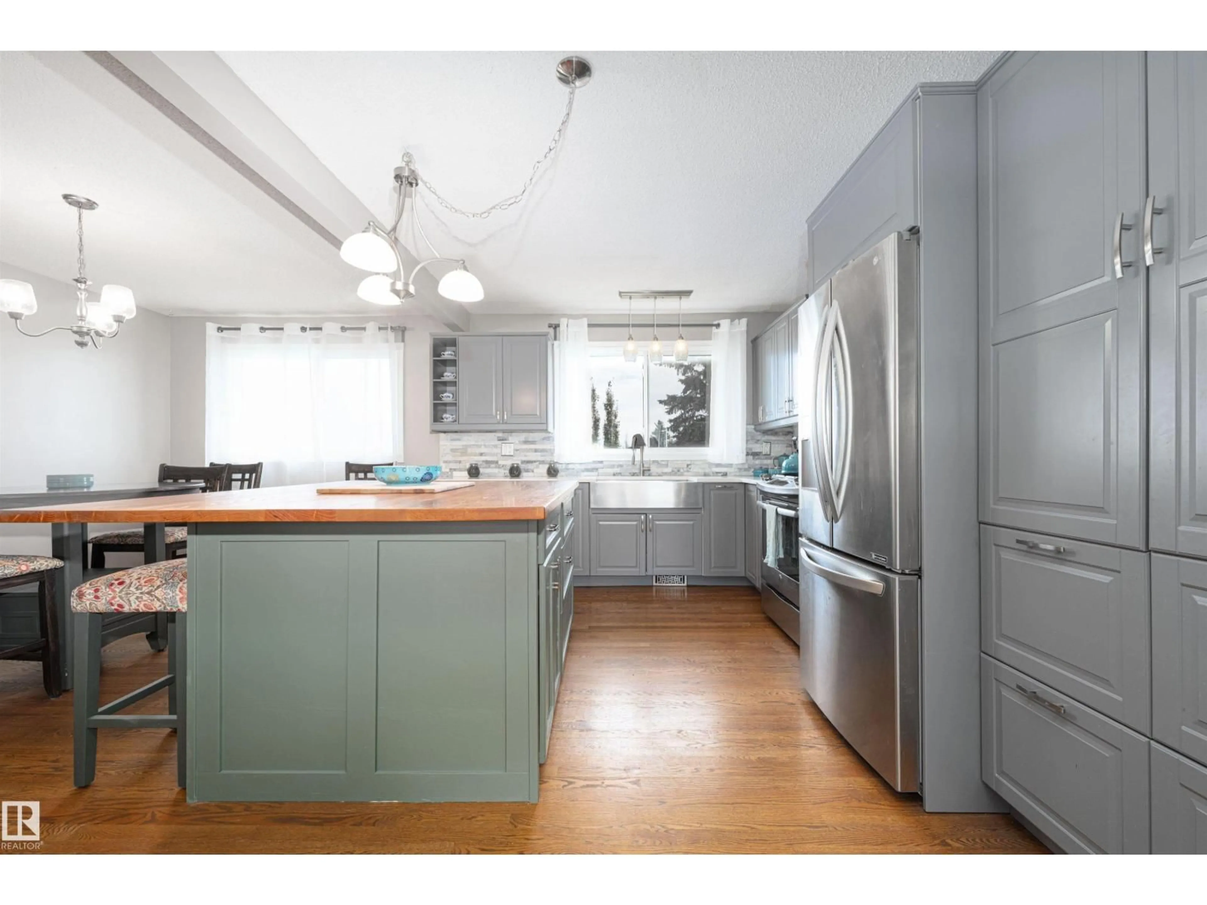 Open concept kitchen, wood/laminate floor for 5019 46 ST, Lamont Alberta T0B2R0